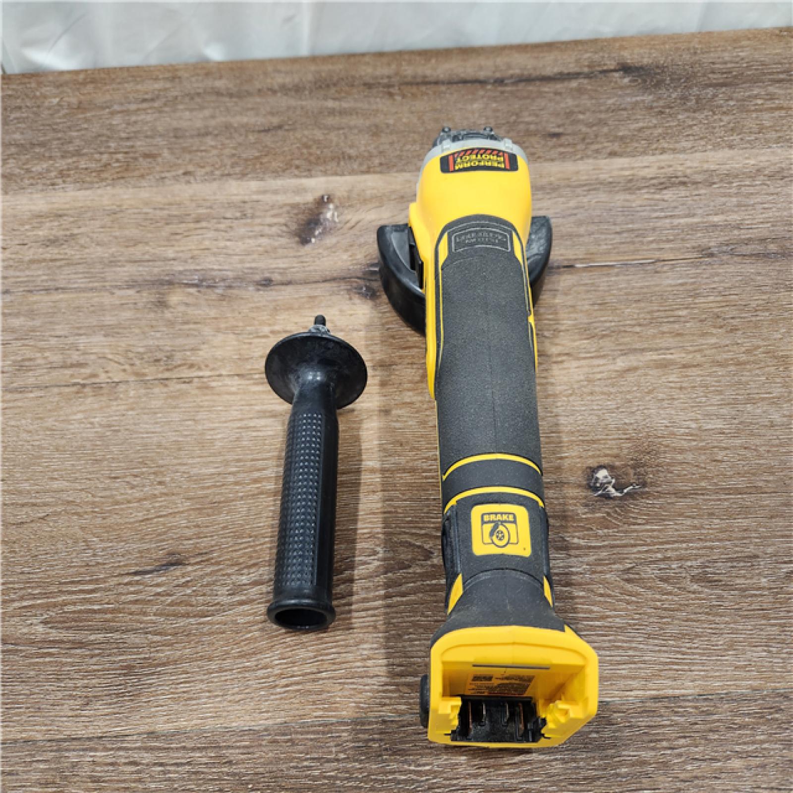 AS-IS DEWALT 20V MAX XR Brushless Cordless 4-1/2 in. Slide Switch Small Angle Grinder (Tool-Only)