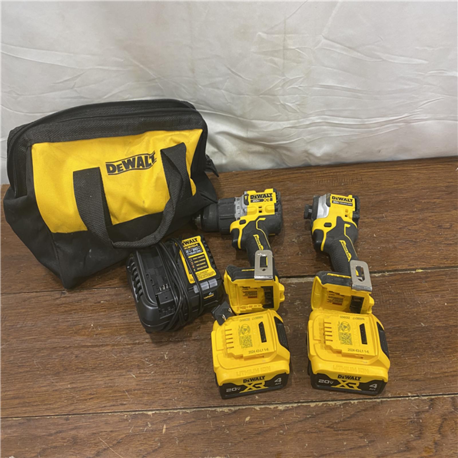 AS-IS DEWALT 20V MAX XR Hammer Drill and ATOMIC Impact Driver 2 Tool Cordless Combo Kit with (2) 4.0Ah Batteries, Charger, and Bag