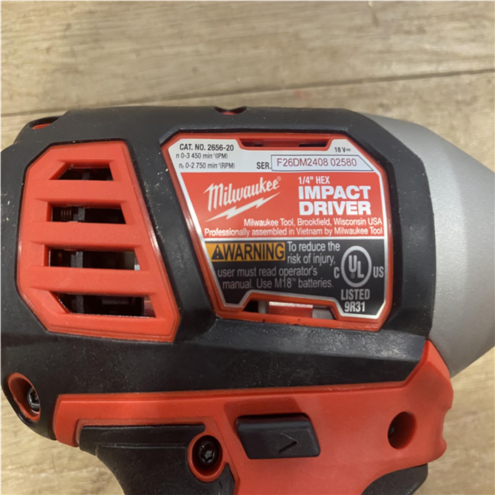 AS-IS Milwaukee 18V Lithium-Ion Cordless 1/4 in. Hex Impact Driver (Tool-Only)