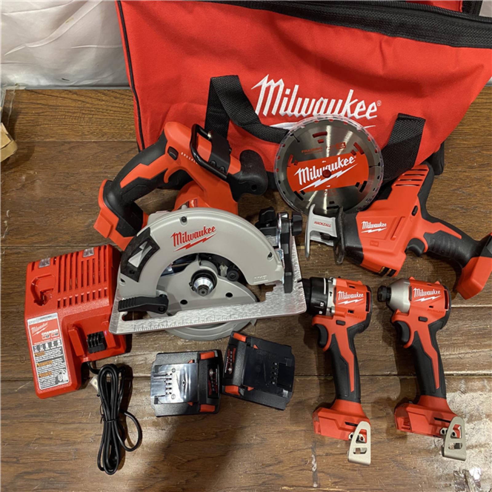 AS-IS Milwaukee M18 18-Volt Lithium-Ion Brushless Cordless Combo Kit (4-Tool) with 2-Batteries, 1-Charger and Tool Bag