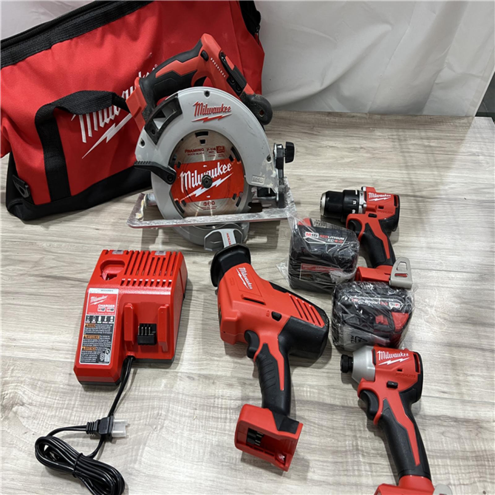 AS-IS Milwaukee 18-Volt Lithium-Ion Brushless Cordless (4-Tool) Combo Kit