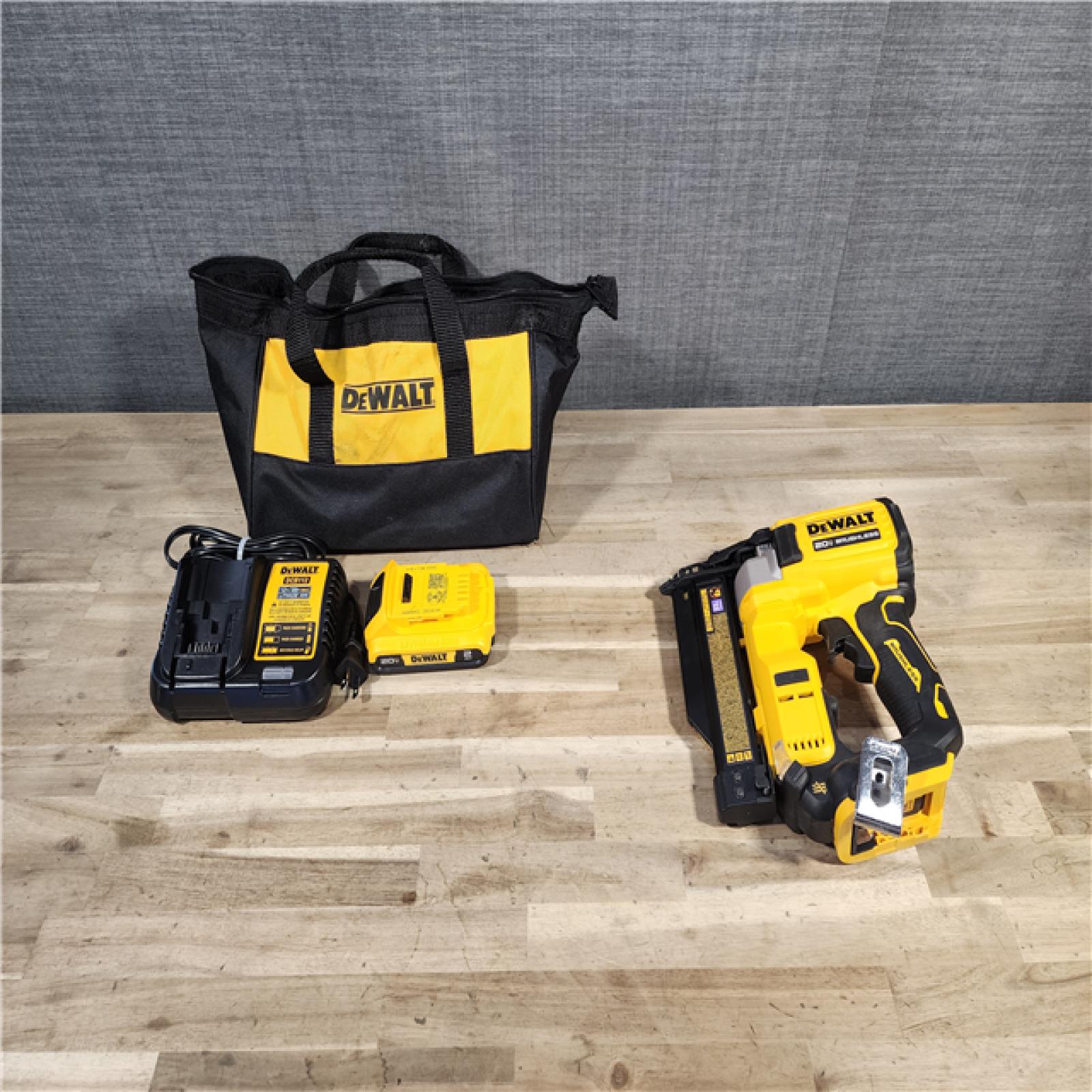 HOUSTON LOCATION - AS-IS DEWALT ATOMIC 20V MAX Lithium Ion Cordless 23 Gauge Pin Nailer Kit with 2.0Ah Battery and Charger