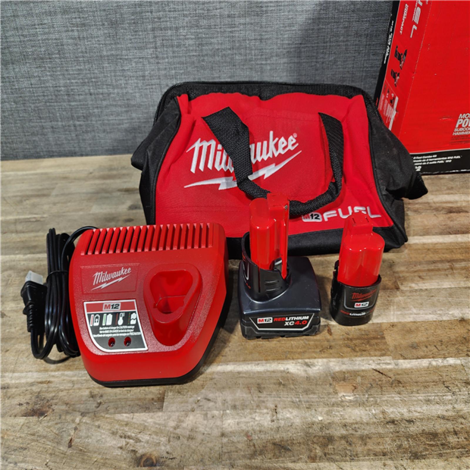 HOUSTON LOCATION - AS-IS Milwaukee FUEL 12-Volt Lithium-Ion Brushless Cordless Hammer Drill and Impact Driver Combo Kit
