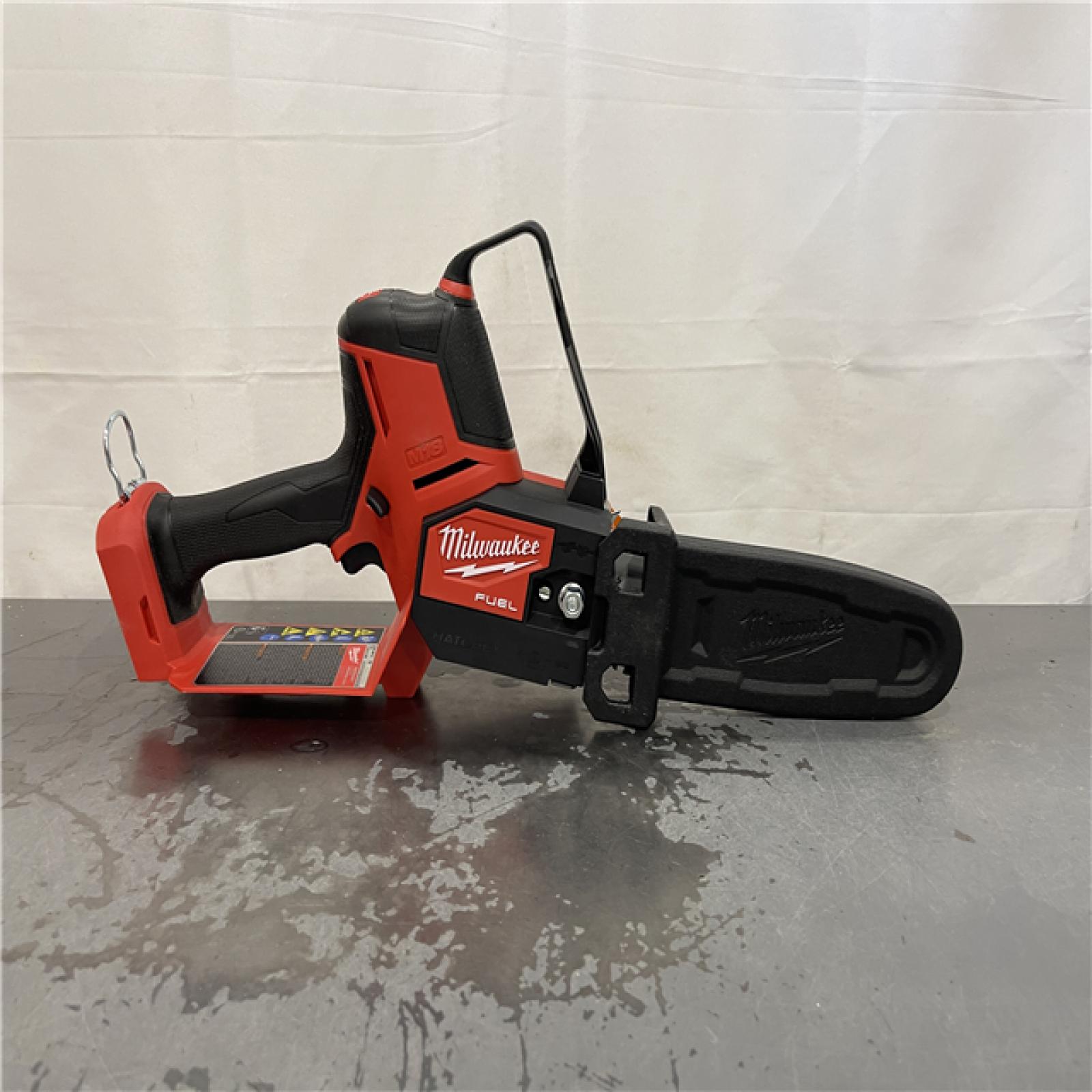 AS-IS- Milwaukee M18 FUEL 8 in. 18V Lithium-Ion Brushless HATCHET Pruning Saw Kit with 6Ah High Output Battery and Charger