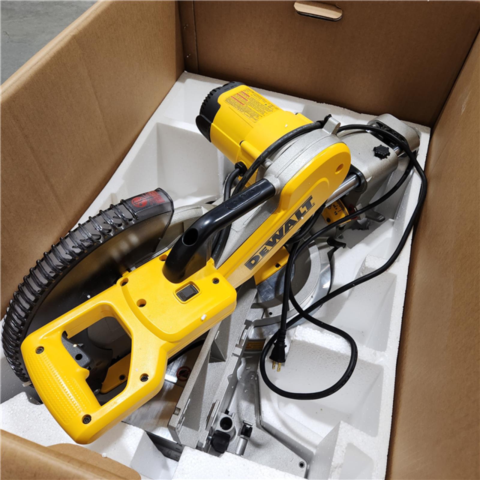 Like New  DEWALT 15 Amp Corded 12 in. Double Bevel Sliding Compound Miter Saw, Blade Wrench and Material Clamp