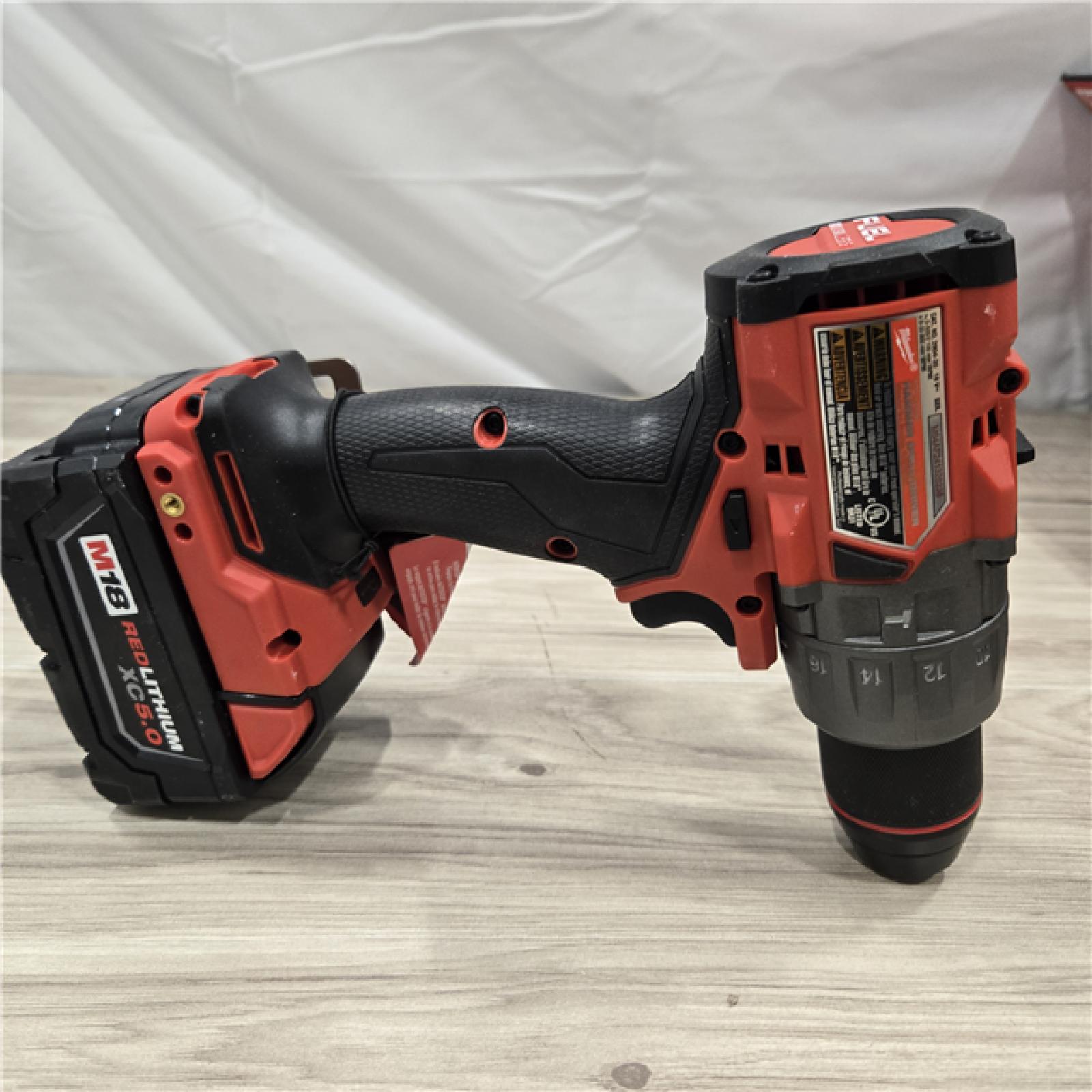 AS-IS MILWAUKEE FUEL 18V Lithium-Ion Brushless Cordless Hammer Drill and Impact Driver Combo Kit (2-Tool) with 2 Batteries