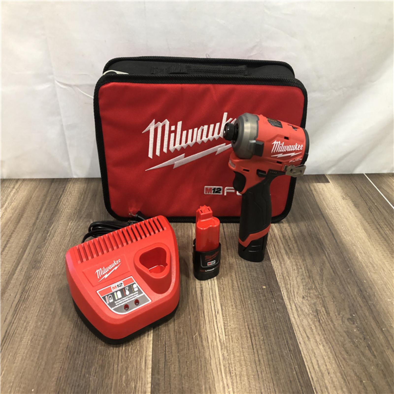 AS-IS Milwaukee FUEL SURGE 12V Lithium-Ion Brushless Cordless 1/4 in. Hex Impact Driver Compact Kit