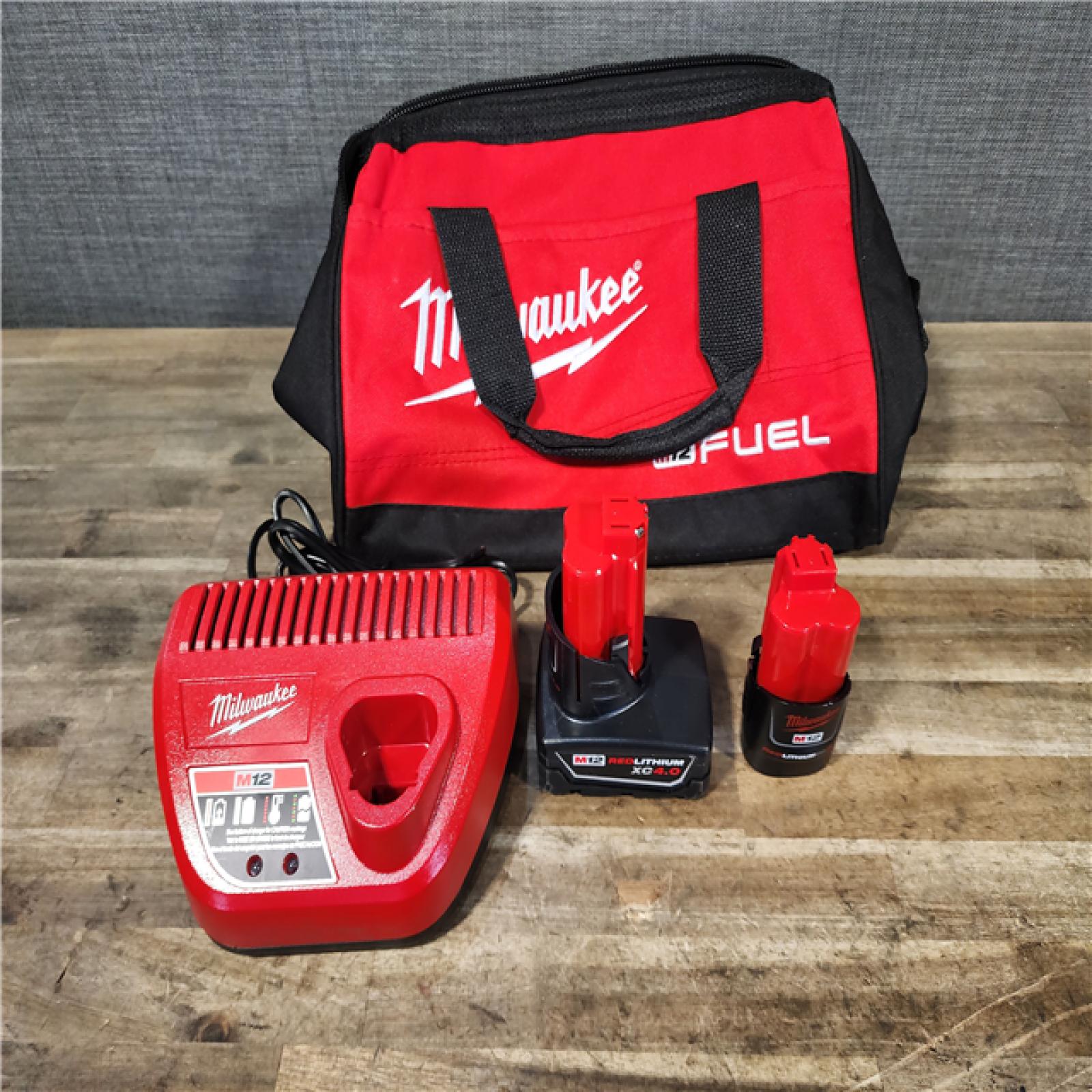 HOUSTON LOCATION - AS-IS Milwaukee FUEL 12-Volt Lithium-Ion Brushless Cordless Hammer Drill and Impact Driver Combo Kit