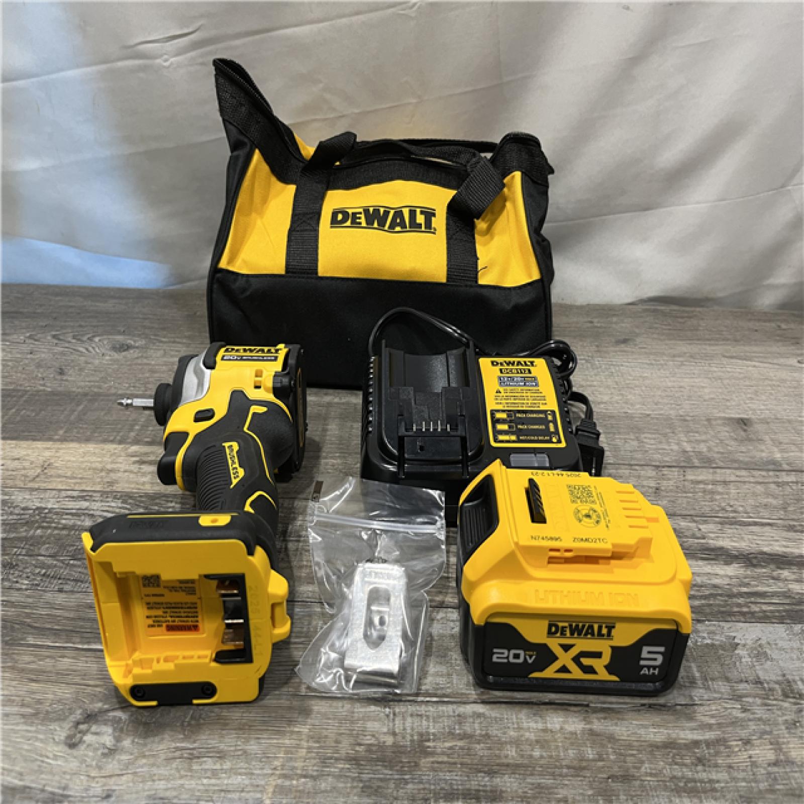 AS-IS DEWALT ATOMIC 20V MAX Lithium-Ion Cordless 1/4 in. Brushless Impact Driver Kit