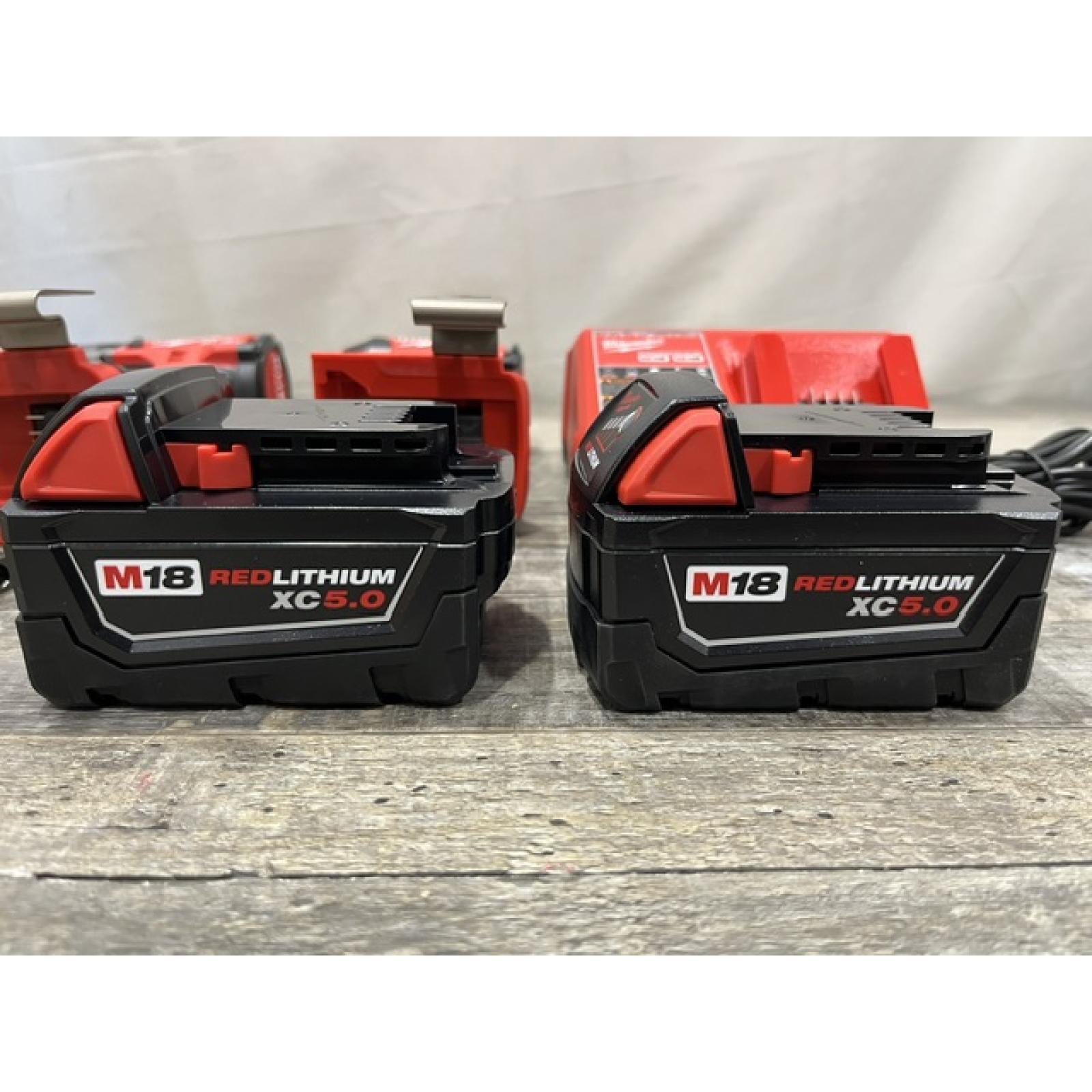 AS-IS Milwaukee FUEL 18V Lithium-Ion Brushless Cordless Hammer Drill and Impact Driver Combo Kit