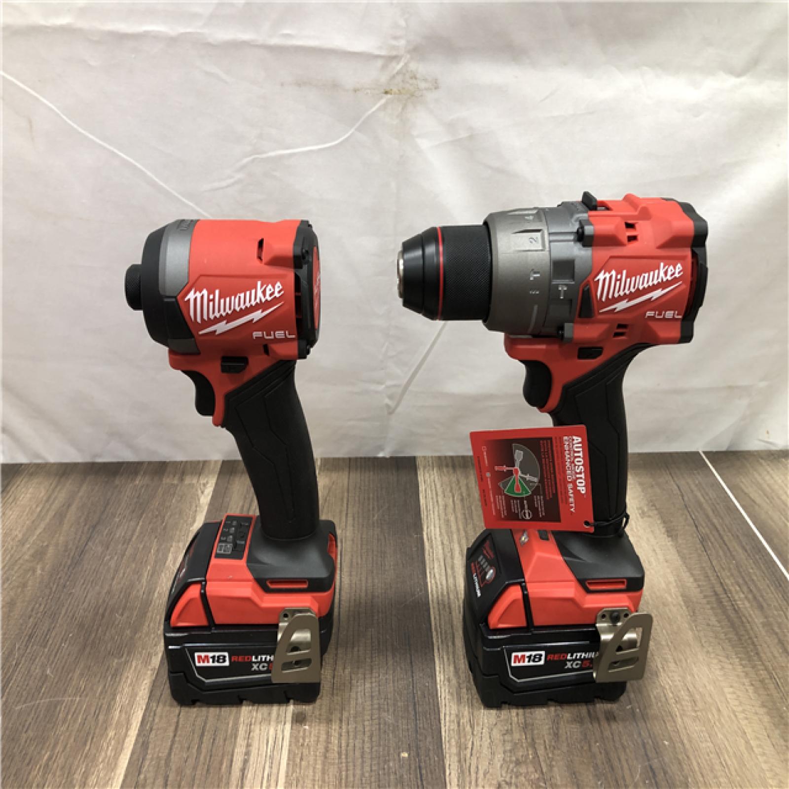 AS-IS Milwaukee FUEL 18V Lithium-Ion Brushless Cordless Hammer Drill and Impact Driver Combo Kit
