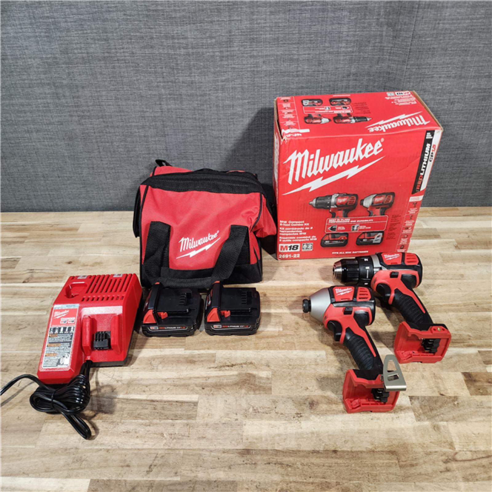 HOUSTON LOCATION - AS-IS Milwaukee 18V Lithium-Ion Cordless Drill Driver/Impact Driver Combo Kit