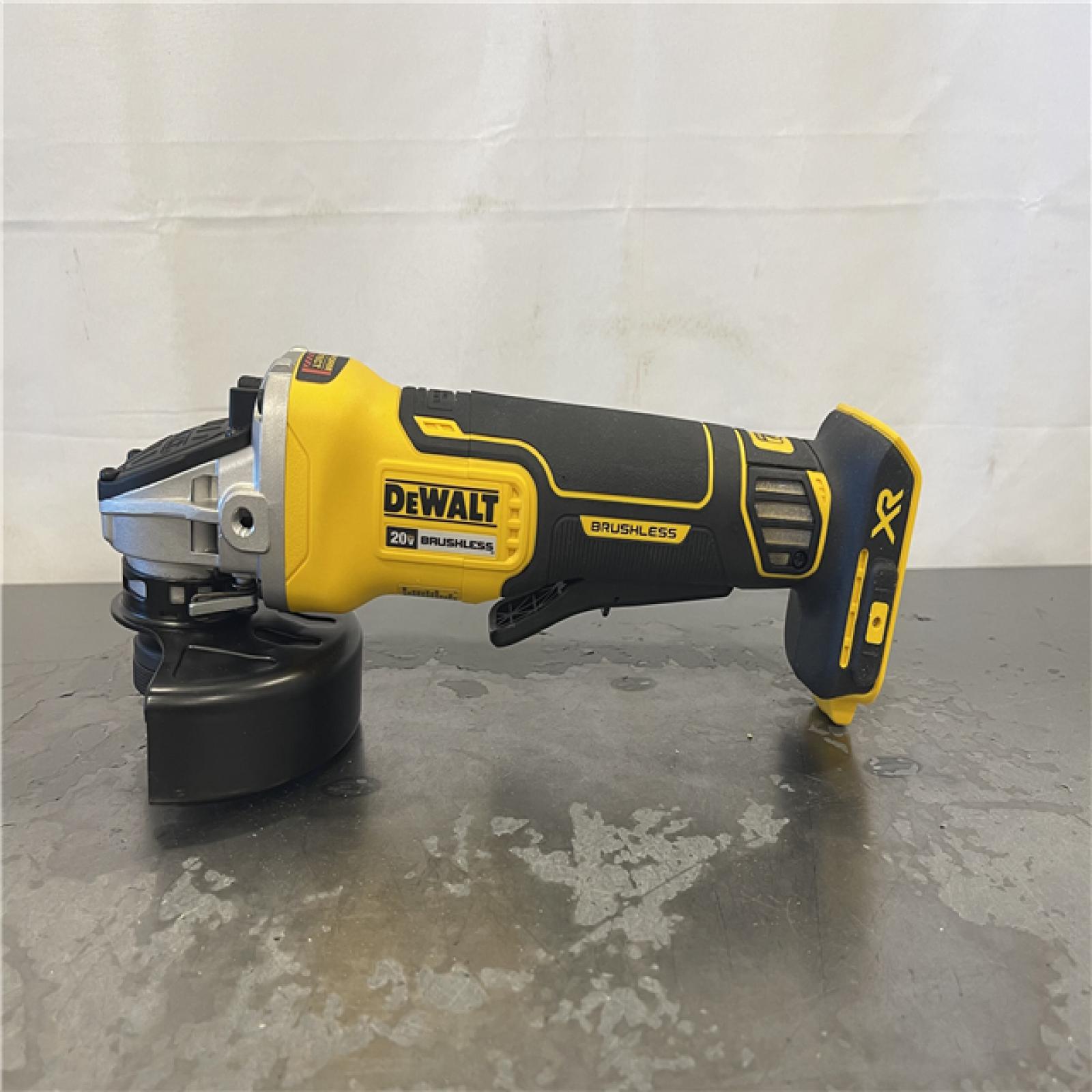 AS-IS- DeWalt 20-Volt MAX XR Cordless Brushless 4-1/2 in. Paddle Switch Small Angle Grinder (Tool-Only)