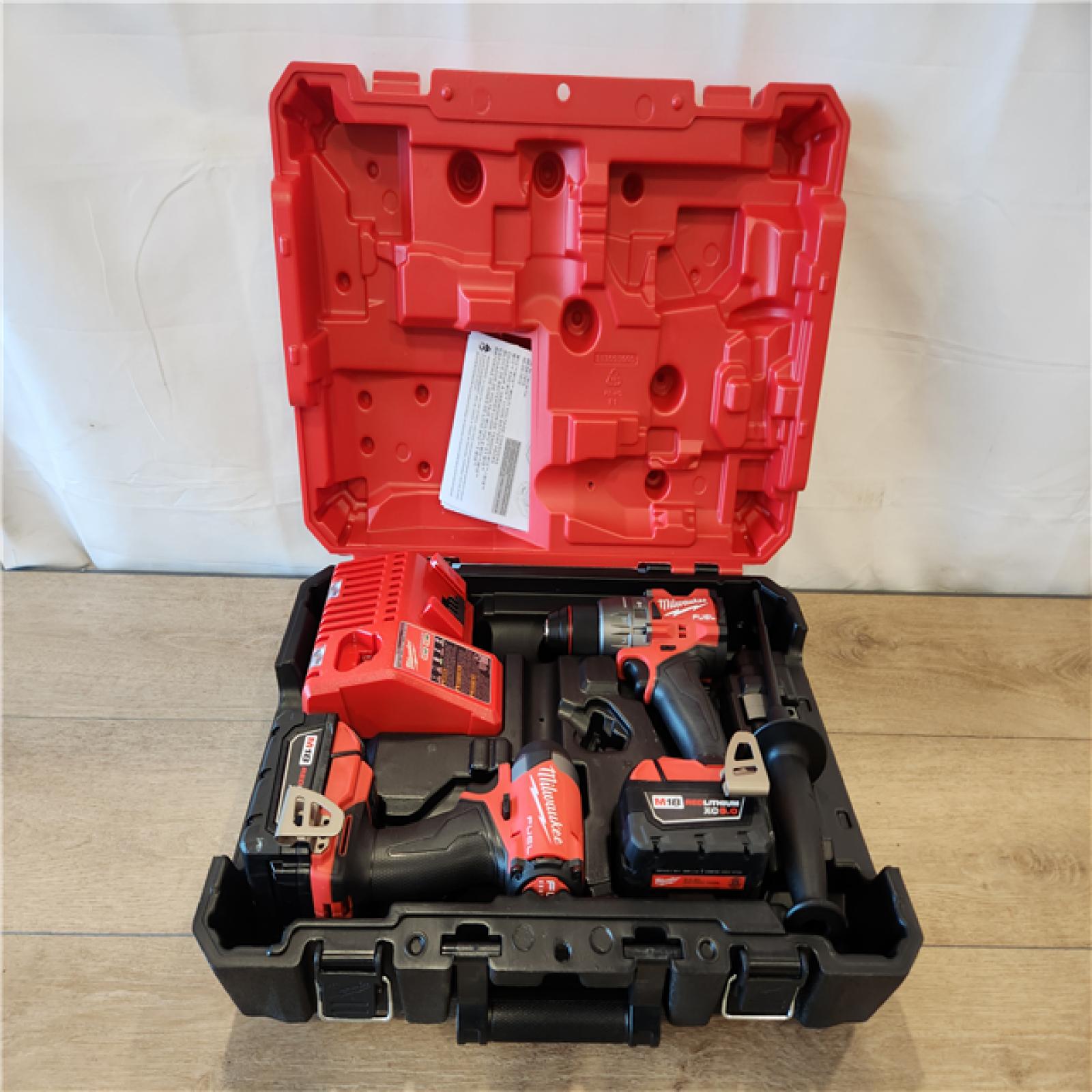 AS-IS- Milwaukee FUEL 18V Lithium-Ion Brushless Cordless Hammer Drill and Impact Driver Combo Kit