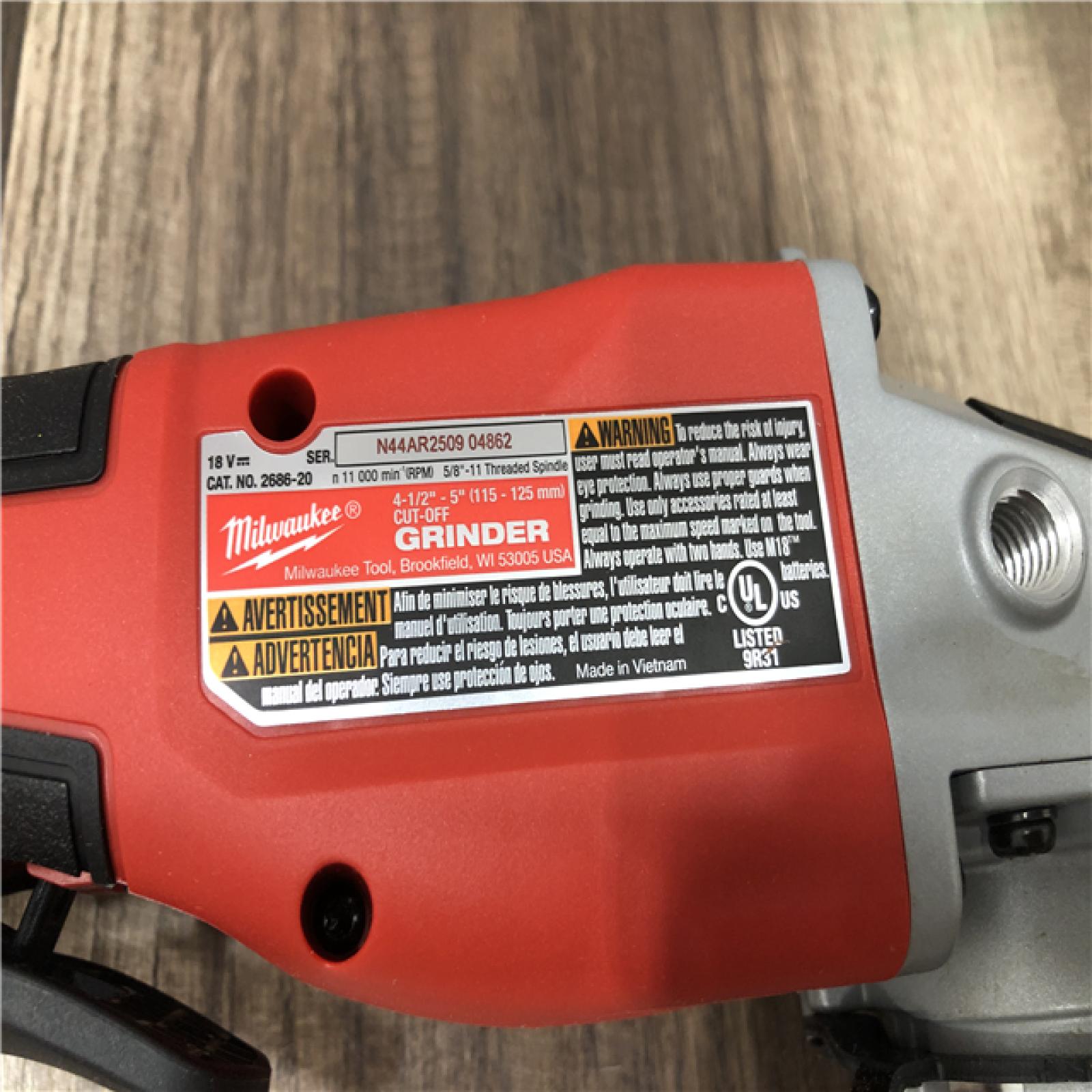 AS-IS Milwaukee 18V Lithium-Ion Brushless Cordless 4-1/2 in./5 in. Grinder w/Paddle Switch (Tool-Only)