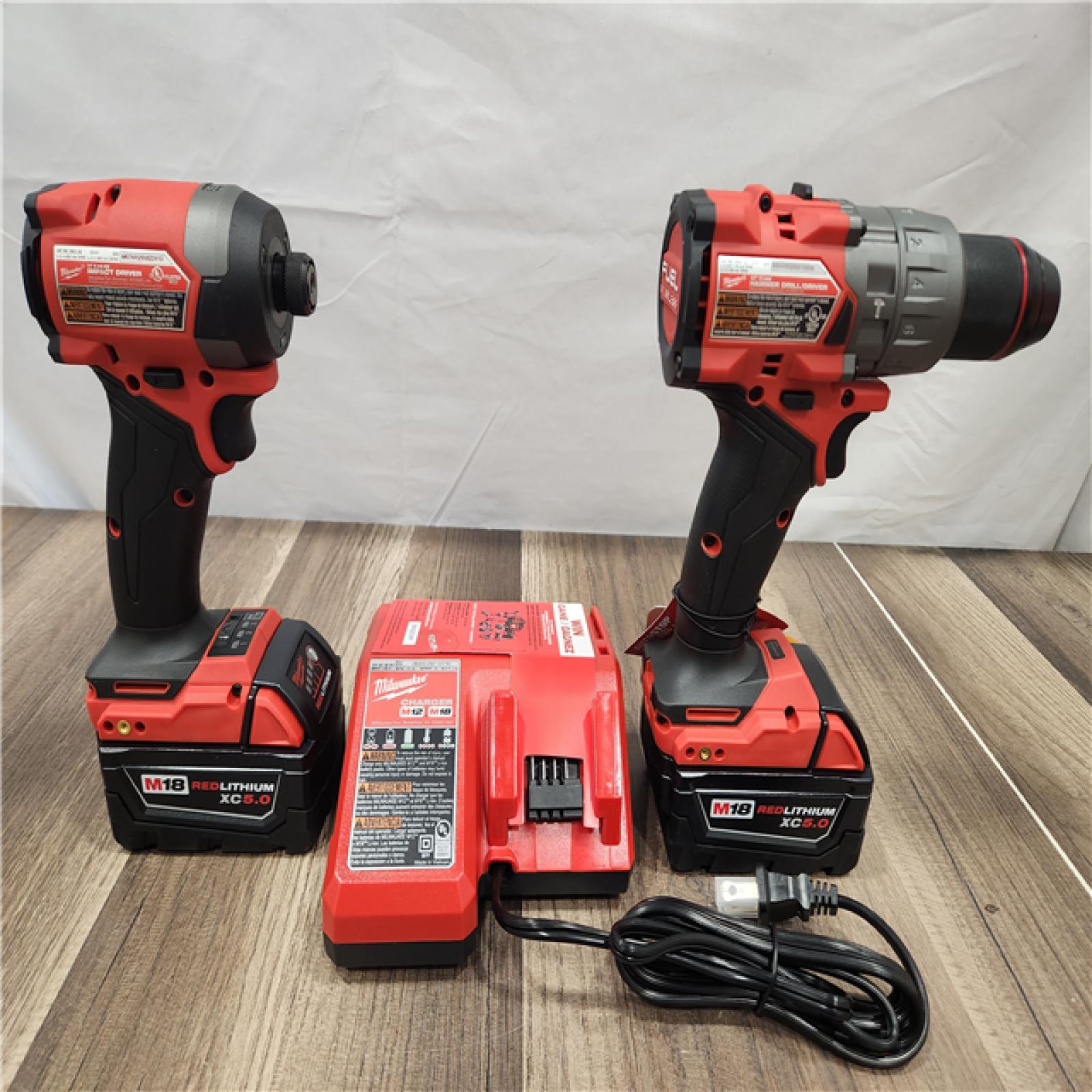 AS-IS- MILWAUKEE FUEL 18V Lithium-Ion Brushless Cordless Hammer Drill and Impact Driver Combo Kit