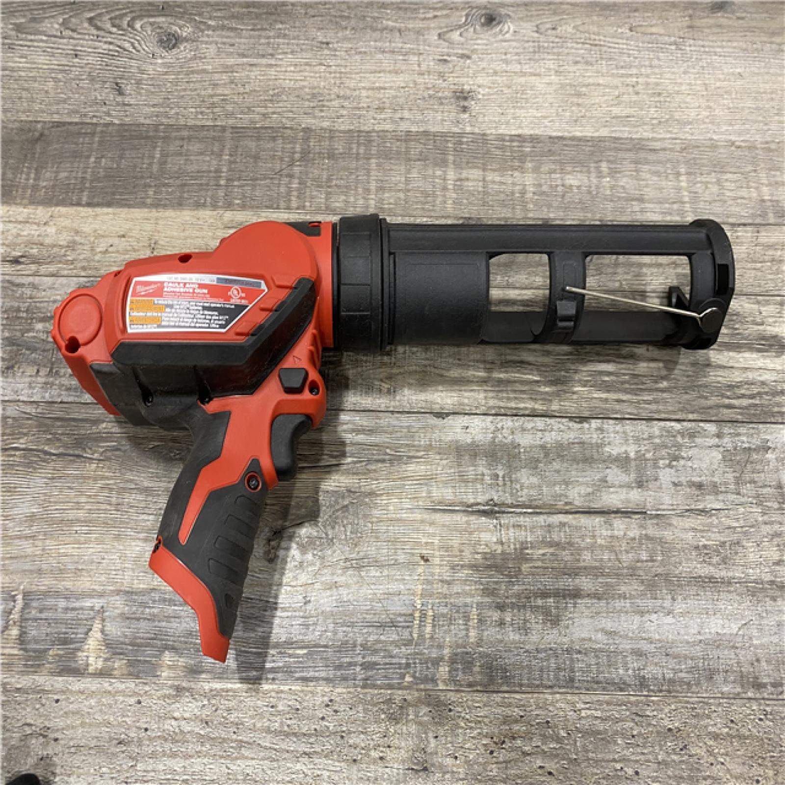 AS-IS Milwaukee 12V Lithium-Ion Cordless 10 oz. Adhesive and Caulk Gun (Tool-Only)