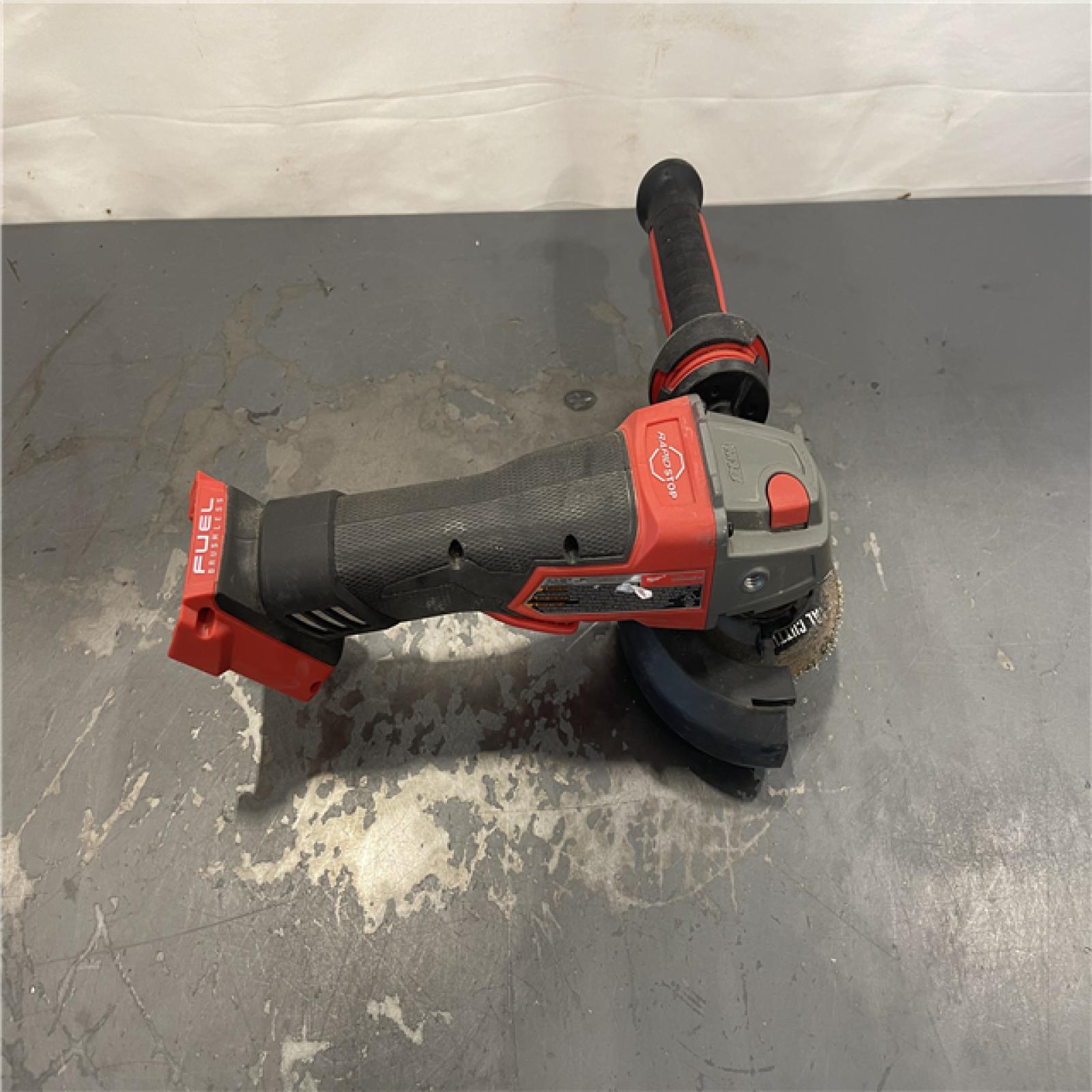AS-IS- Milwaukee FUEL 18-Volt Lithium-Ion Brushless Cordless 4-1/2 in./5 in. Grinder W/Paddle Switch (Tool-Only)