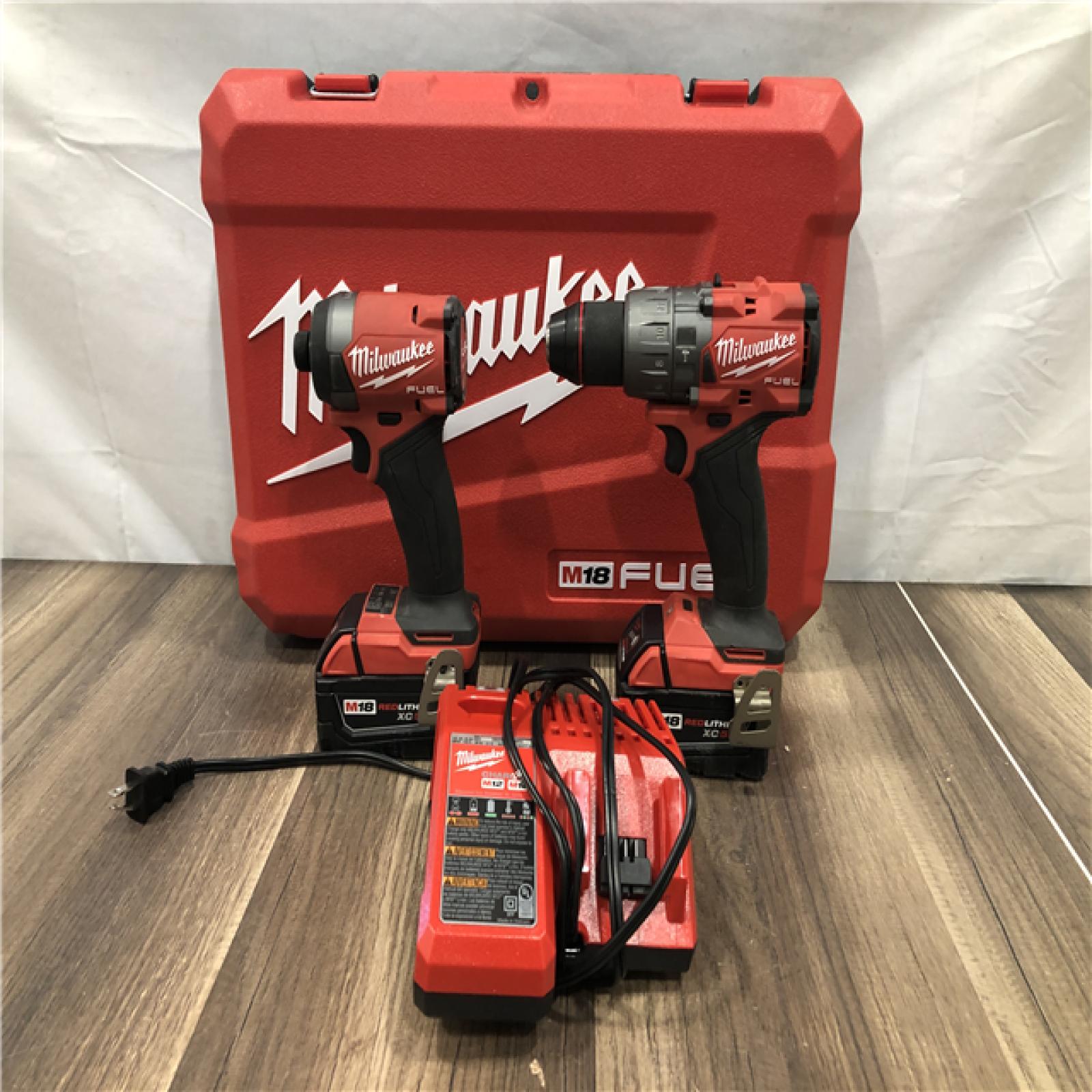 AS-IS Milwaukee  FUEL 18V Lithium-Ion Brushless Cordless Hammer Drill and Impact Driver Combo Kit