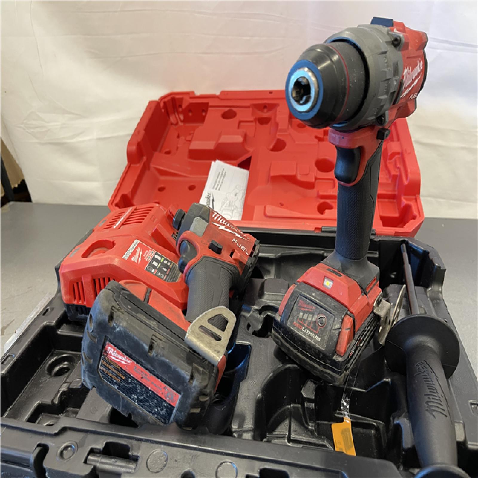 AS-IS - Milwaukee M18 FUEL 18V Lithium-Ion Brushless Cordless Hammer Drill and Impact Driver Combo Kit