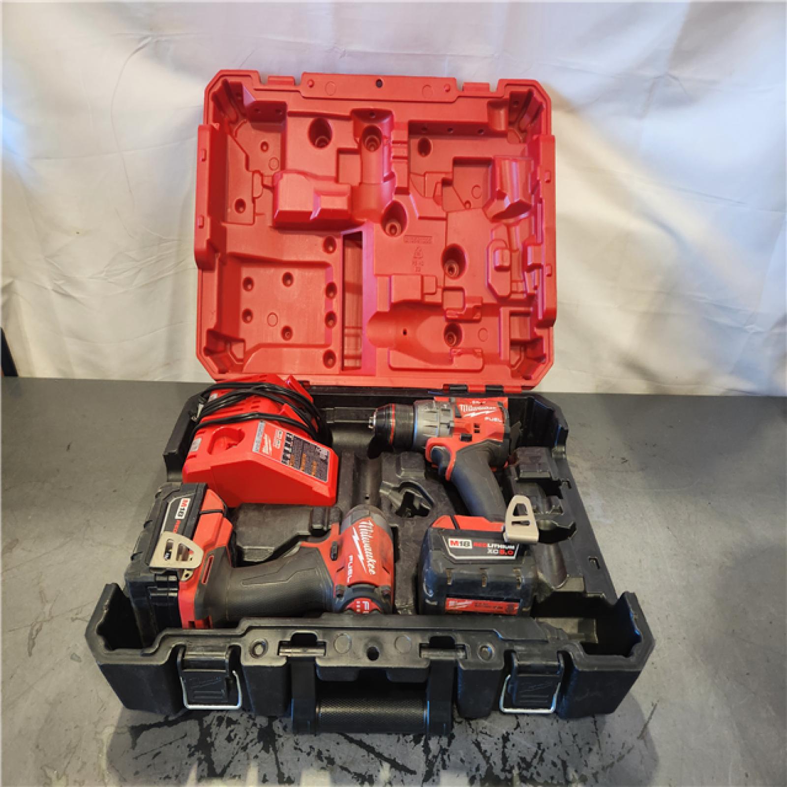 AS-IS- Milwaukee FUEL 18V Lithium-Ion Brushless Cordless Hammer Drill and Impact Driver Combo Kit