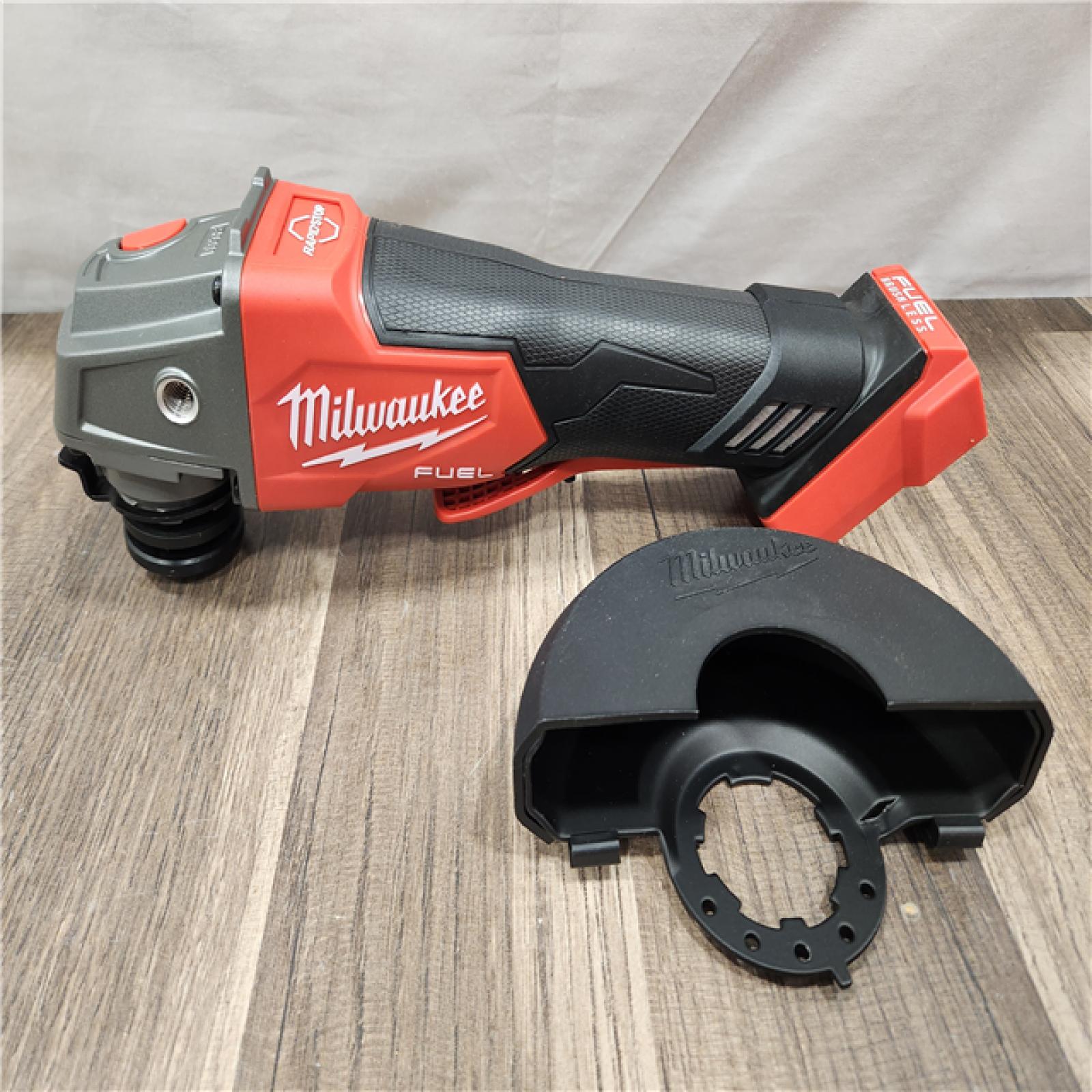 AS-IS- Milwaukee FUEL 18-Volt Lithium-Ion Brushless Cordless 4-1/2 in./5 in. Grinder W/Paddle Switch (Tool-Only)