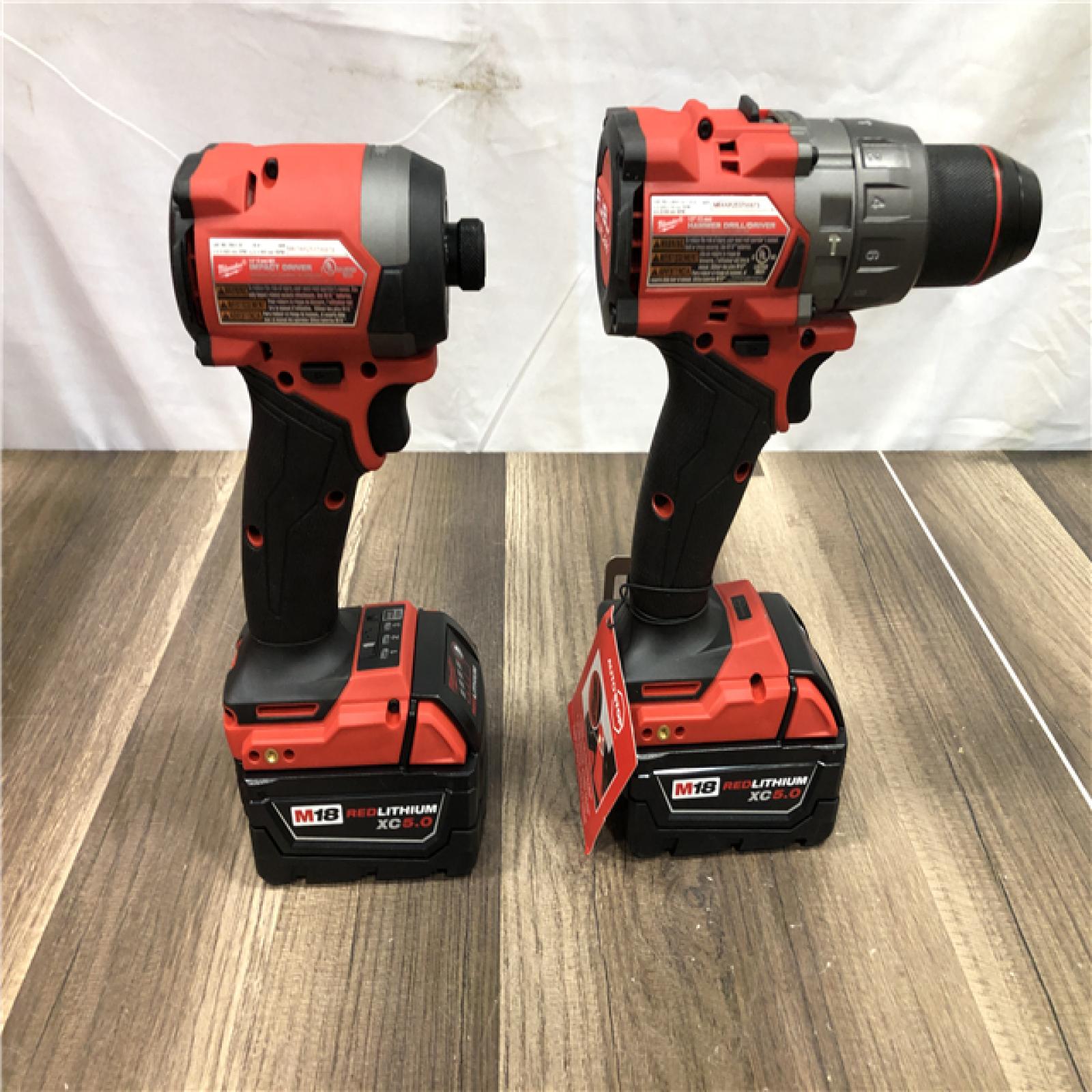 AS-IS Milwaukee FUEL 18V Lithium-Ion Brushless Cordless Hammer Drill and Impact Driver Combo Kit