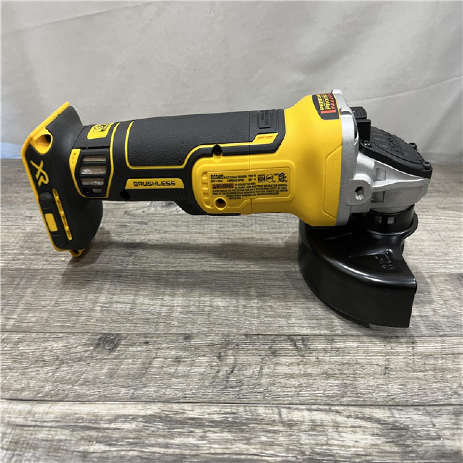 AS-IS DEWALT 20V MAX XR Cordless Brushless 4.5 in. Slide Switch Small Angle Grinder with Kickback Brake (Tool Only)