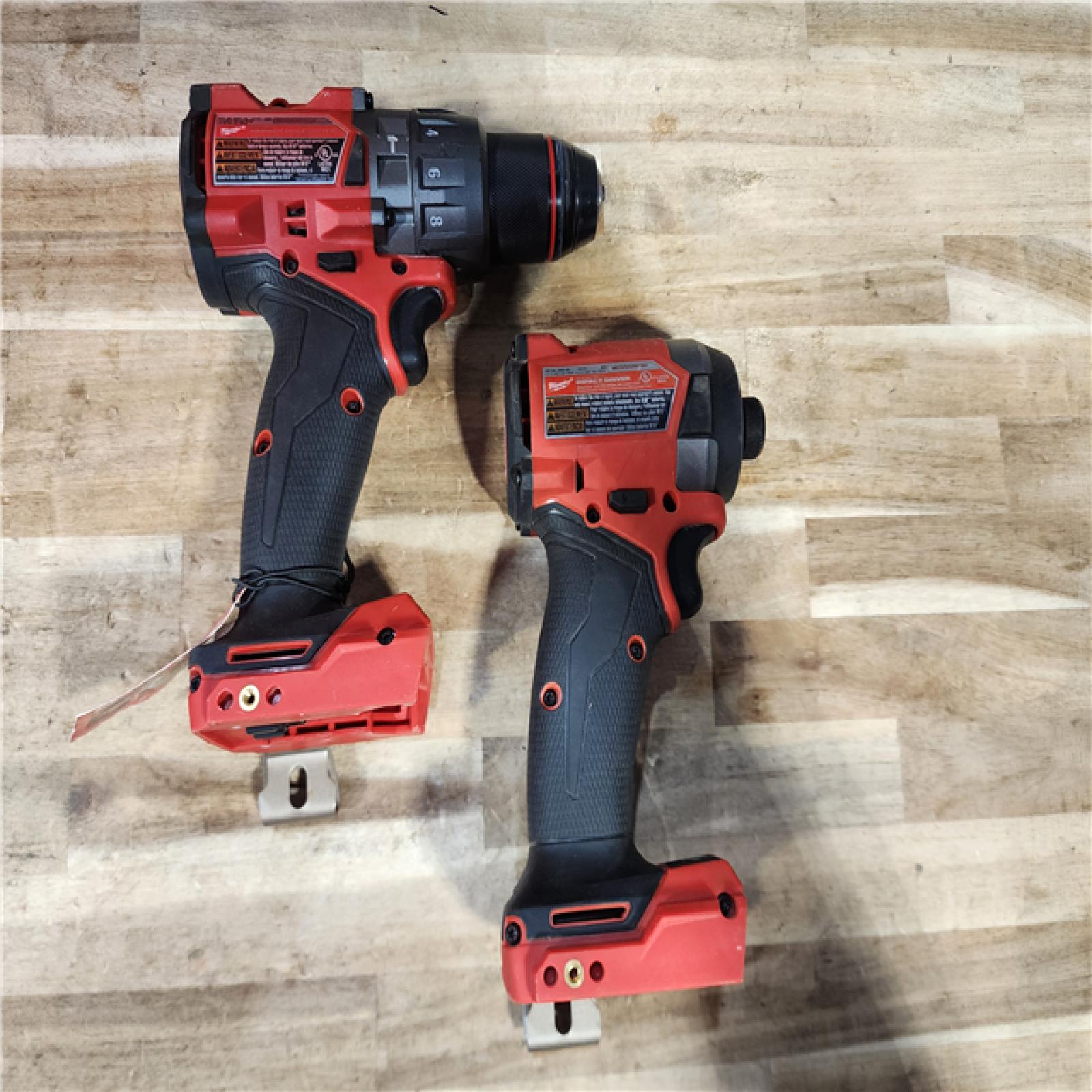 HOUSTON LOCATION - AS-IS Milwaukee FUEL 18V Lithium-Ion Brushless Cordless Hammer Drill and Impact Driver Combo Kit