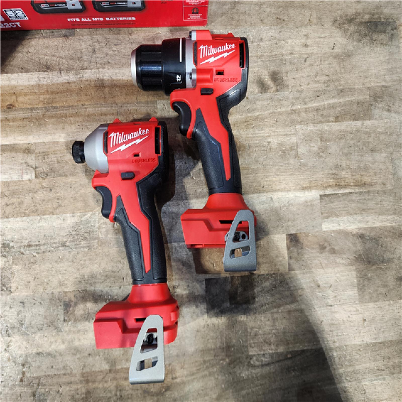 HOUSTON LOCATION - AS-IS Milwaukee M18 18V Lithium-Ion Brushless Cordless Compact Drill/Impact Combo Kit (2-Tool) W/(2) 2.0 Ah Batteries  Charger & Bag