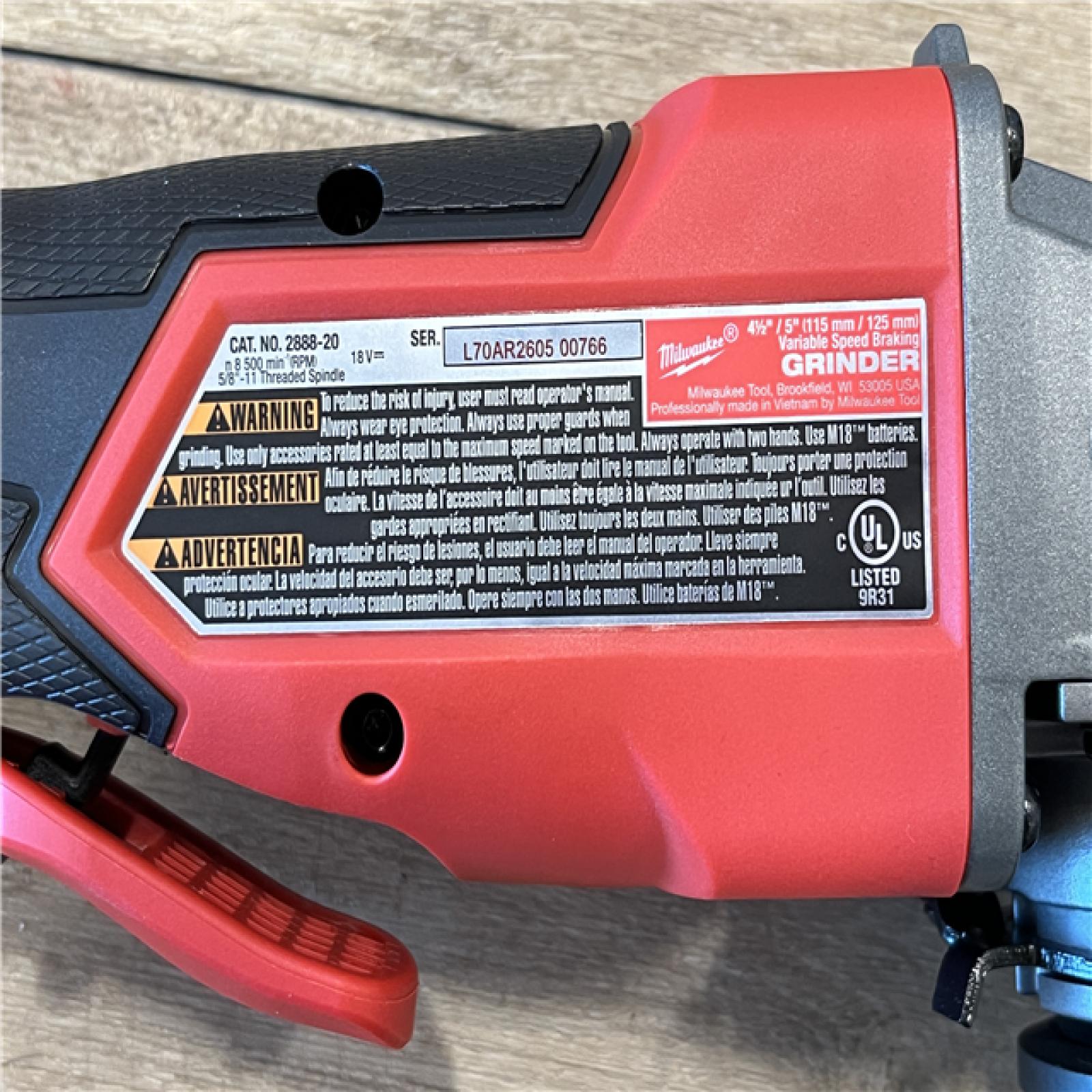 AS-IS Milwaukee FUEL 18V Lithium-Ion Brushless Cordless 4-1/2 in./5 in. Grinder with Variable Speed & Paddle Switch (Tool-Only)