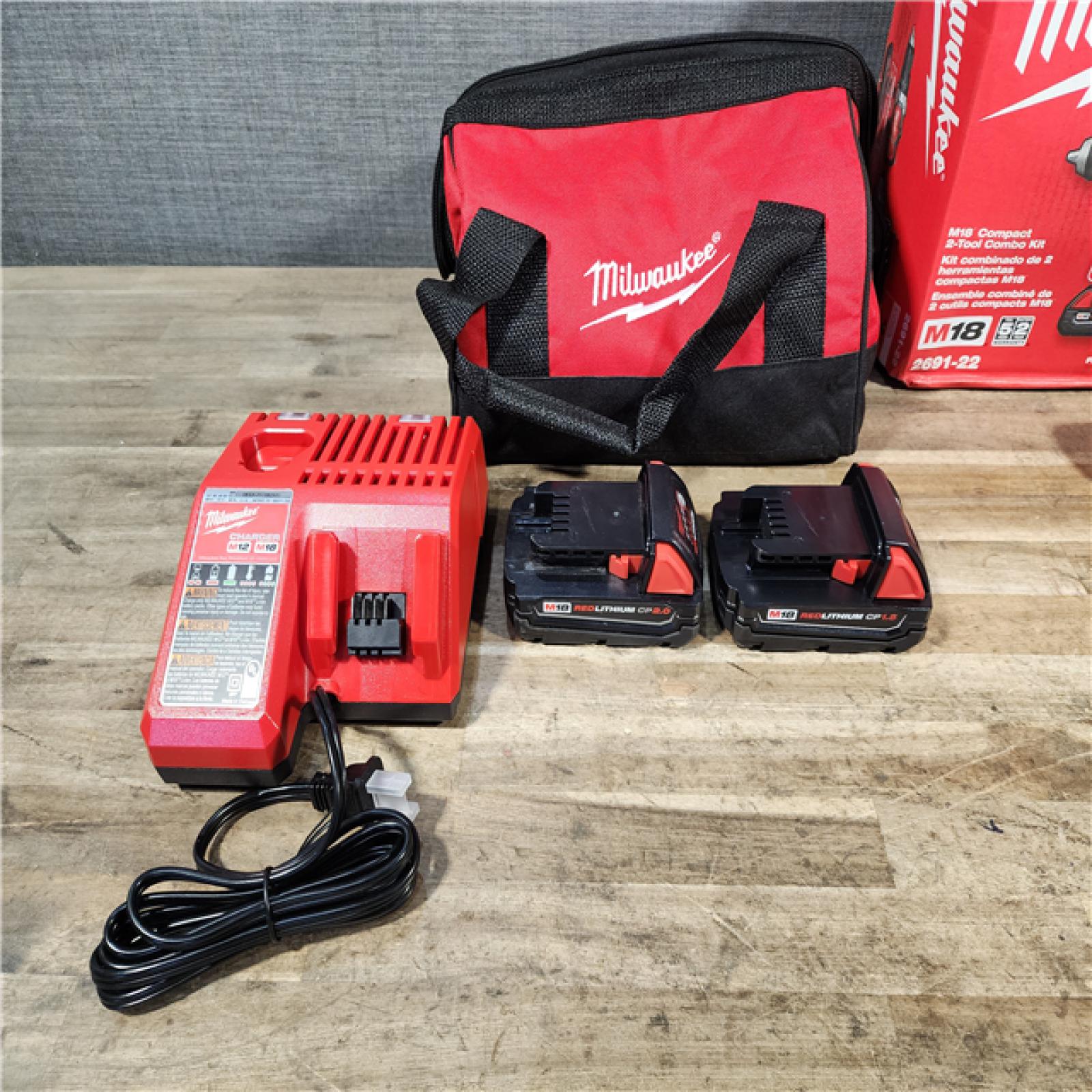 HOUSTON LOCATION - AS-IS Milwaukee 18V Lithium-Ion Cordless Drill Driver/Impact Driver Combo Kit