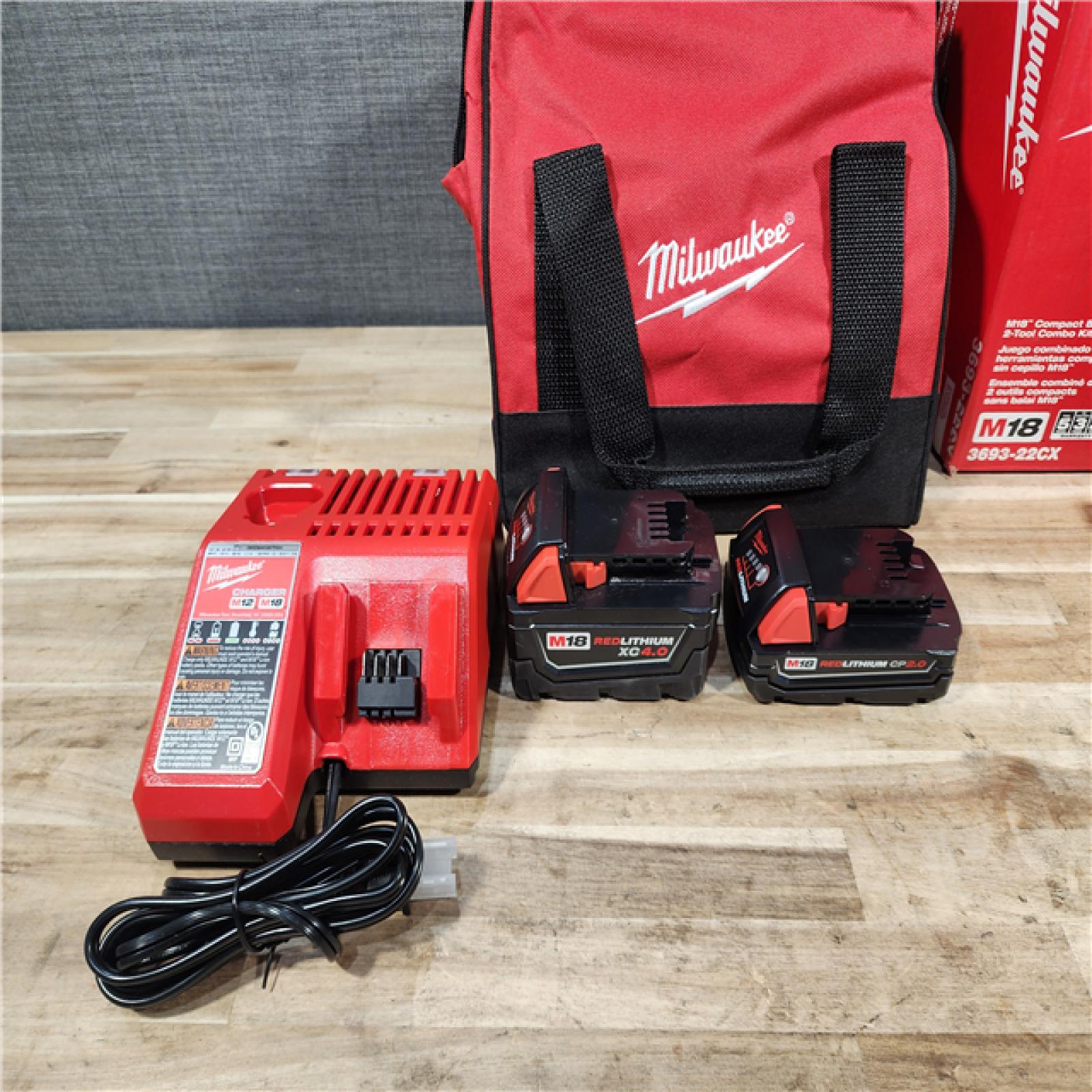 HOUSTON LOCATION - AS-IS (APPEARS LIKE NEW) M18 18-Volt Lithium-Ion Brushless Cordless Compact Hammer Drill/Impact Combo Kit (2-Tool) with (2) Batteries  Bag