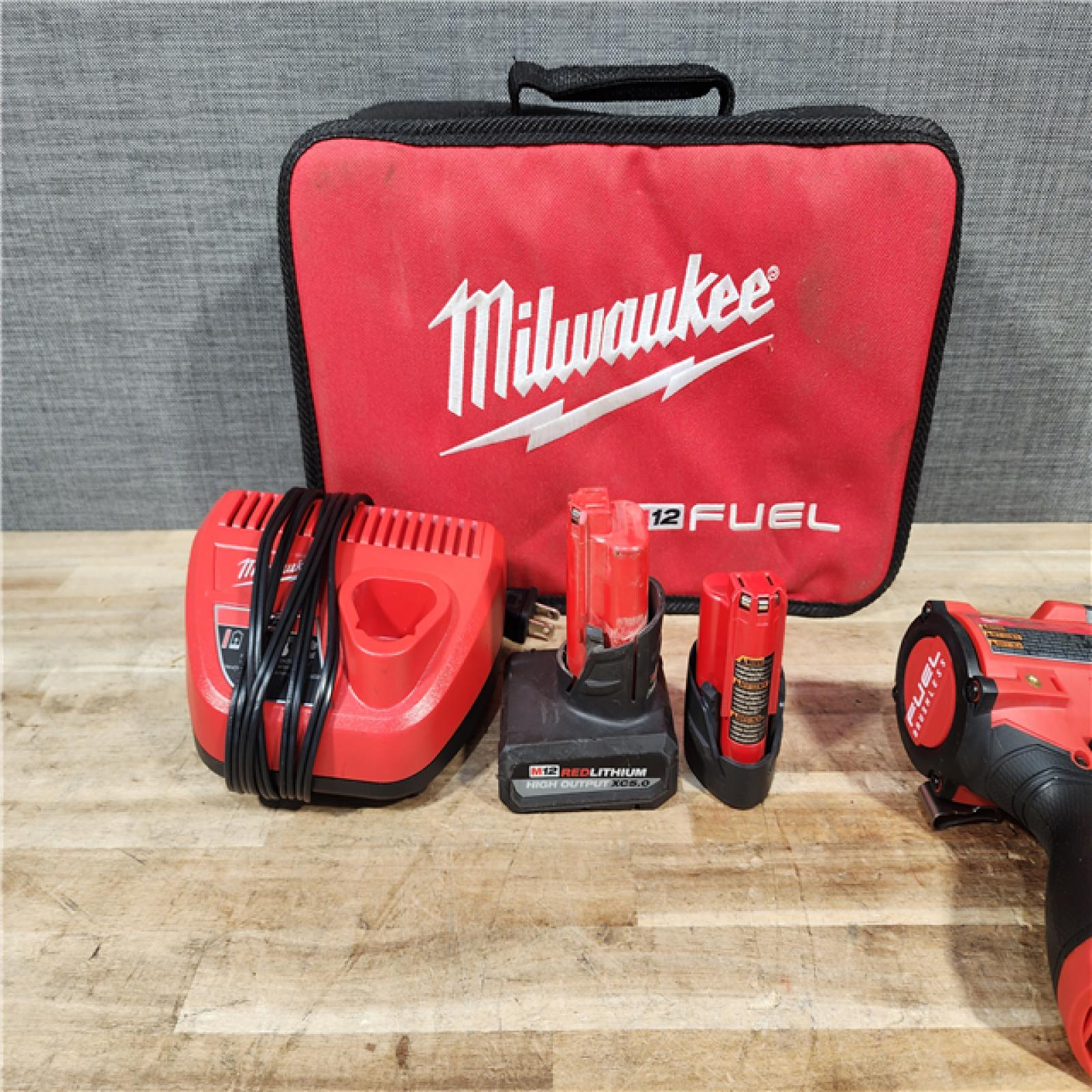 HOUSTON LOCATION - AS - IS Milwaukee FUEL 12V Li-Ion Brushless Cordless Stubby 1/2 in. Impact Wrench Kit