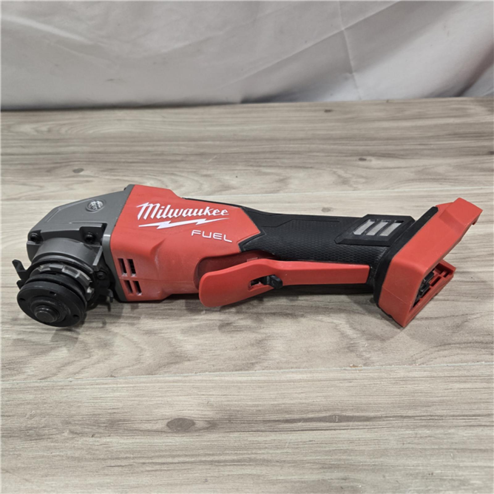 AS-IS Milwaukee 2880-20 FUEL 18V Cordless 4-1/2 in./5 in. Grinder  (Tool-Only)