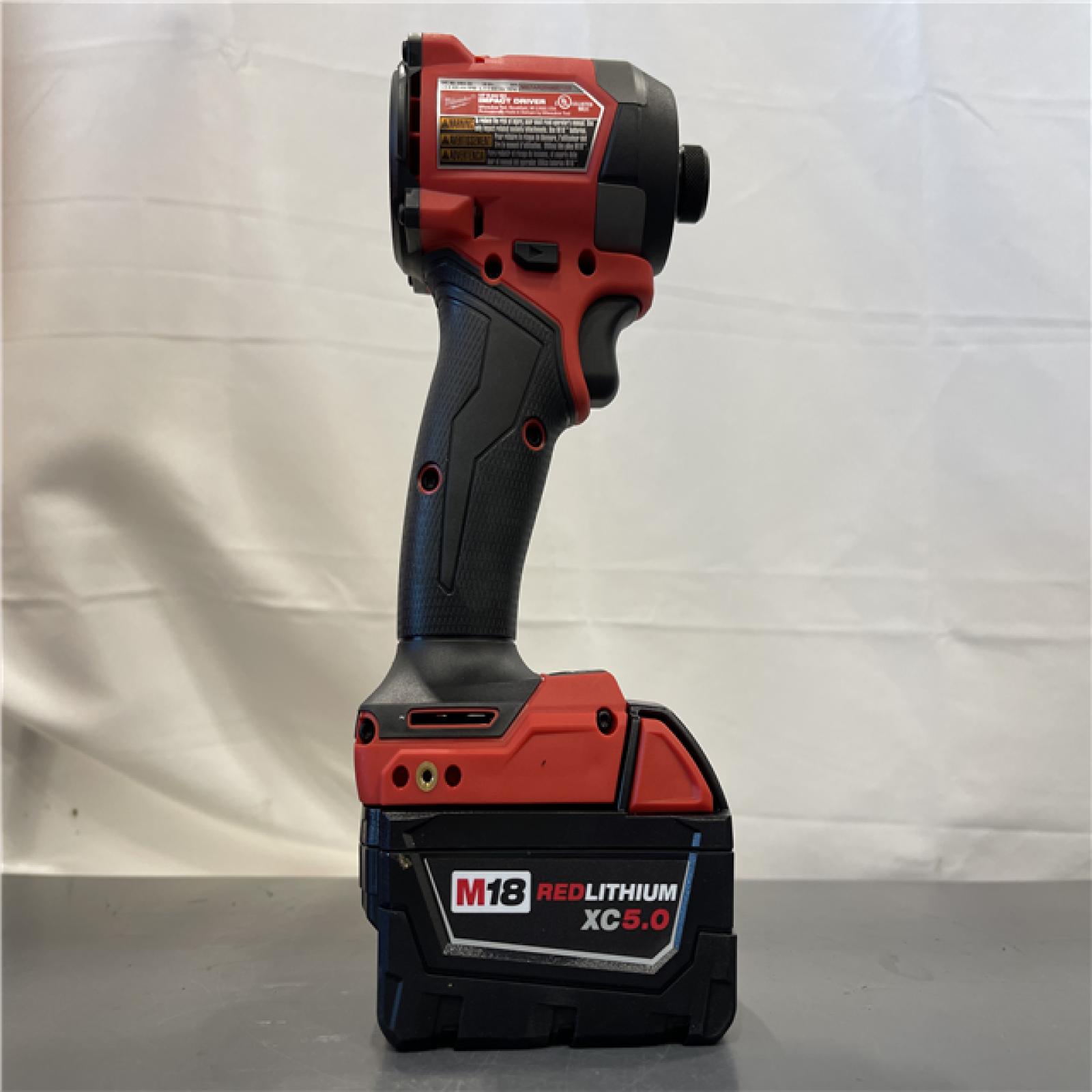 AS-IS - MILWAUKEE FUEL 18V Lithium-Ion Impact Driver with M18 REDLITHIUM XC5.0 battery