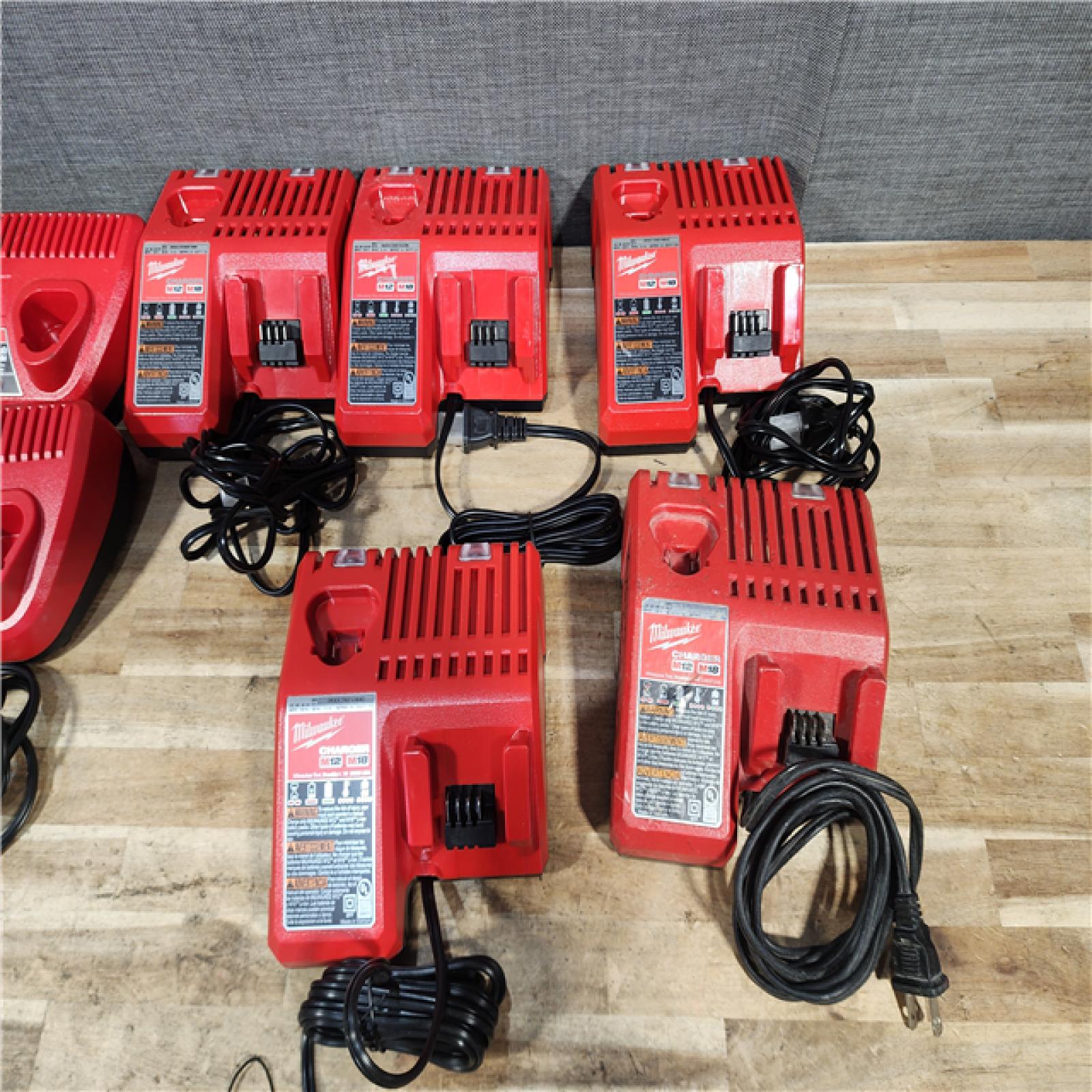 HOUSTON LOCATION - AS - IS MILWAUKEE BATTERY CHARGER PACK QTY - 7