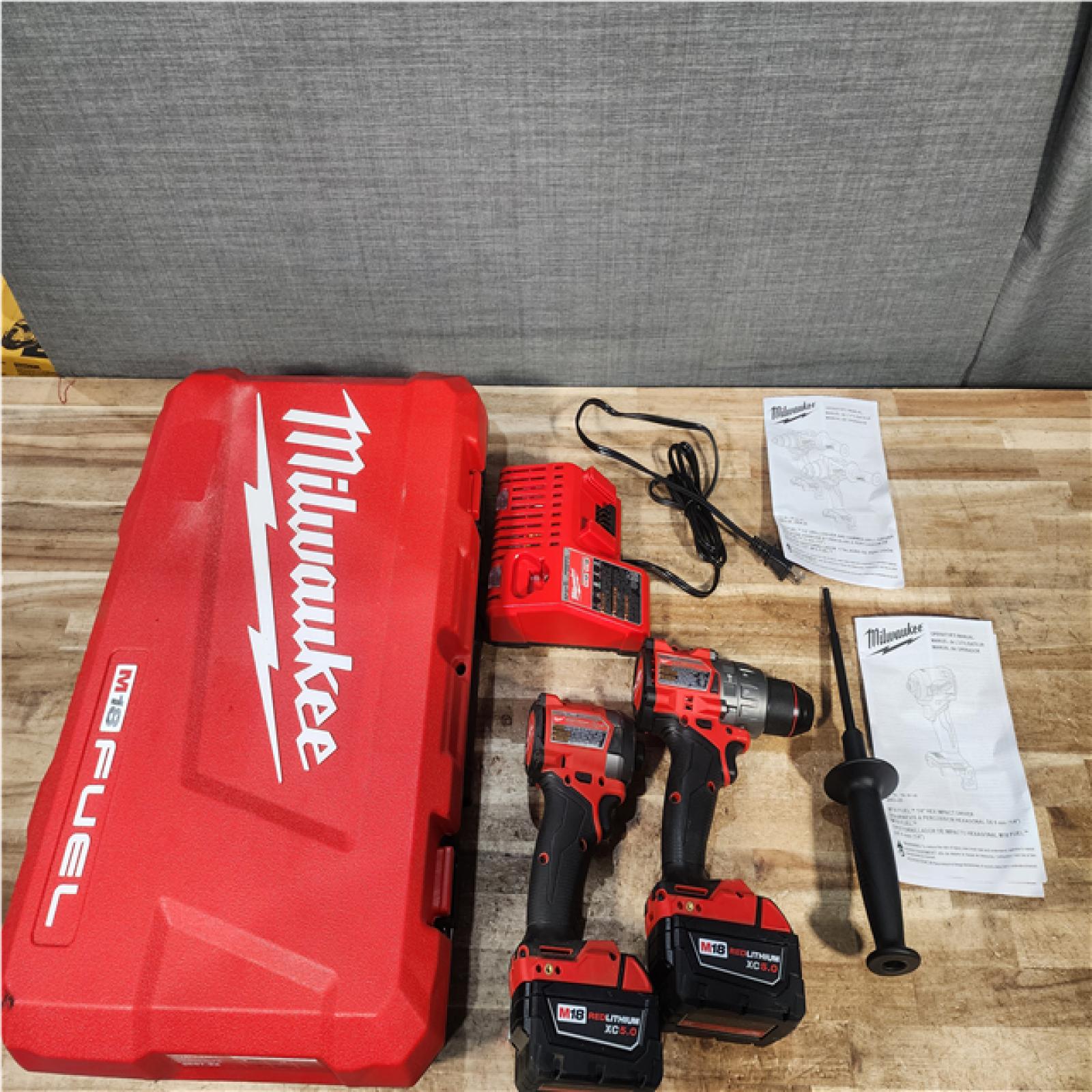Houston Location AS-IS Milwaukee FUEL 18V Lithium-Ion Brushless Cordless Hammer Drill and Impact Driver Combo Kit