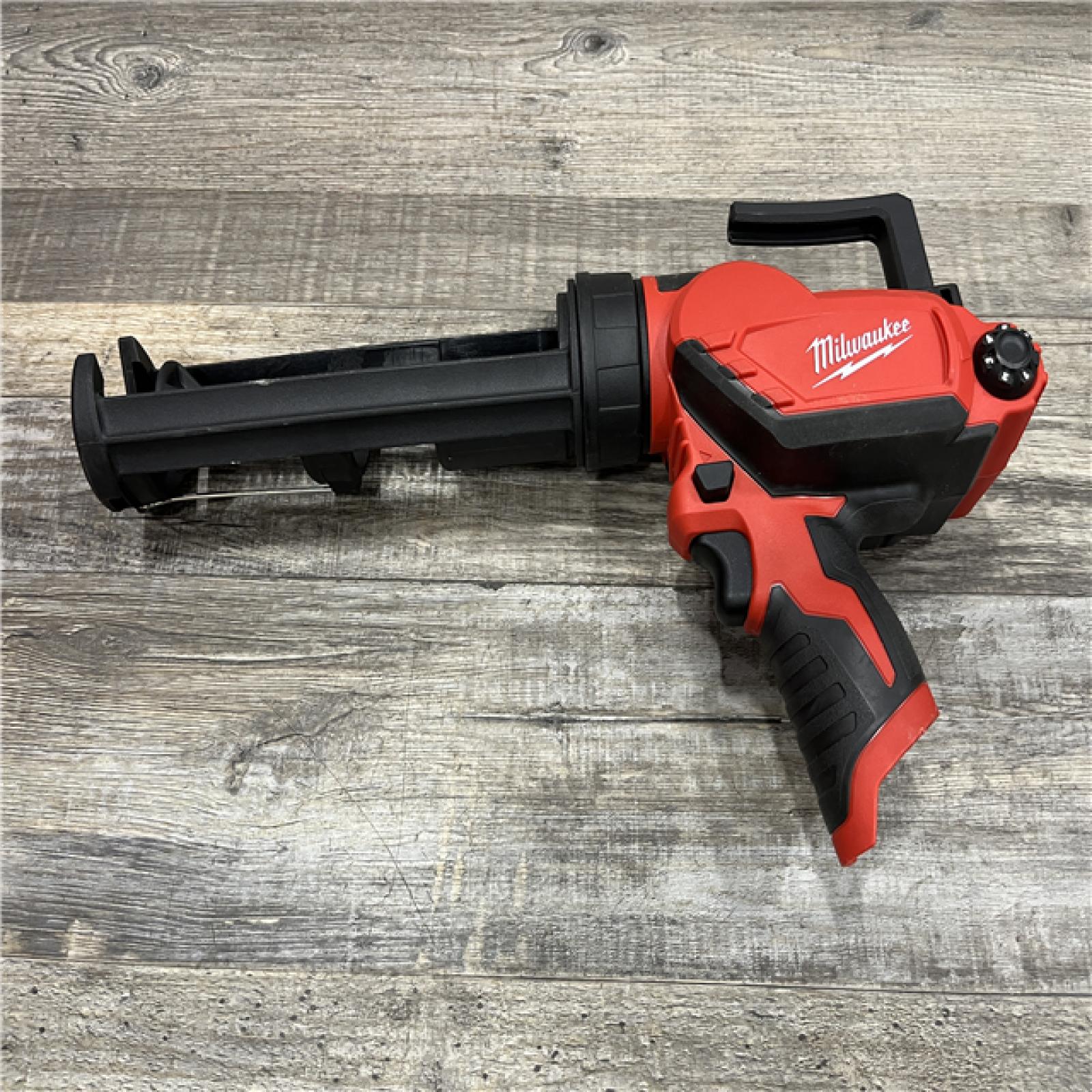 AS-IS Milwaukee 12V Lithium-Ion Cordless 10 oz. Adhesive and Caulk Gun (Tool-Only)