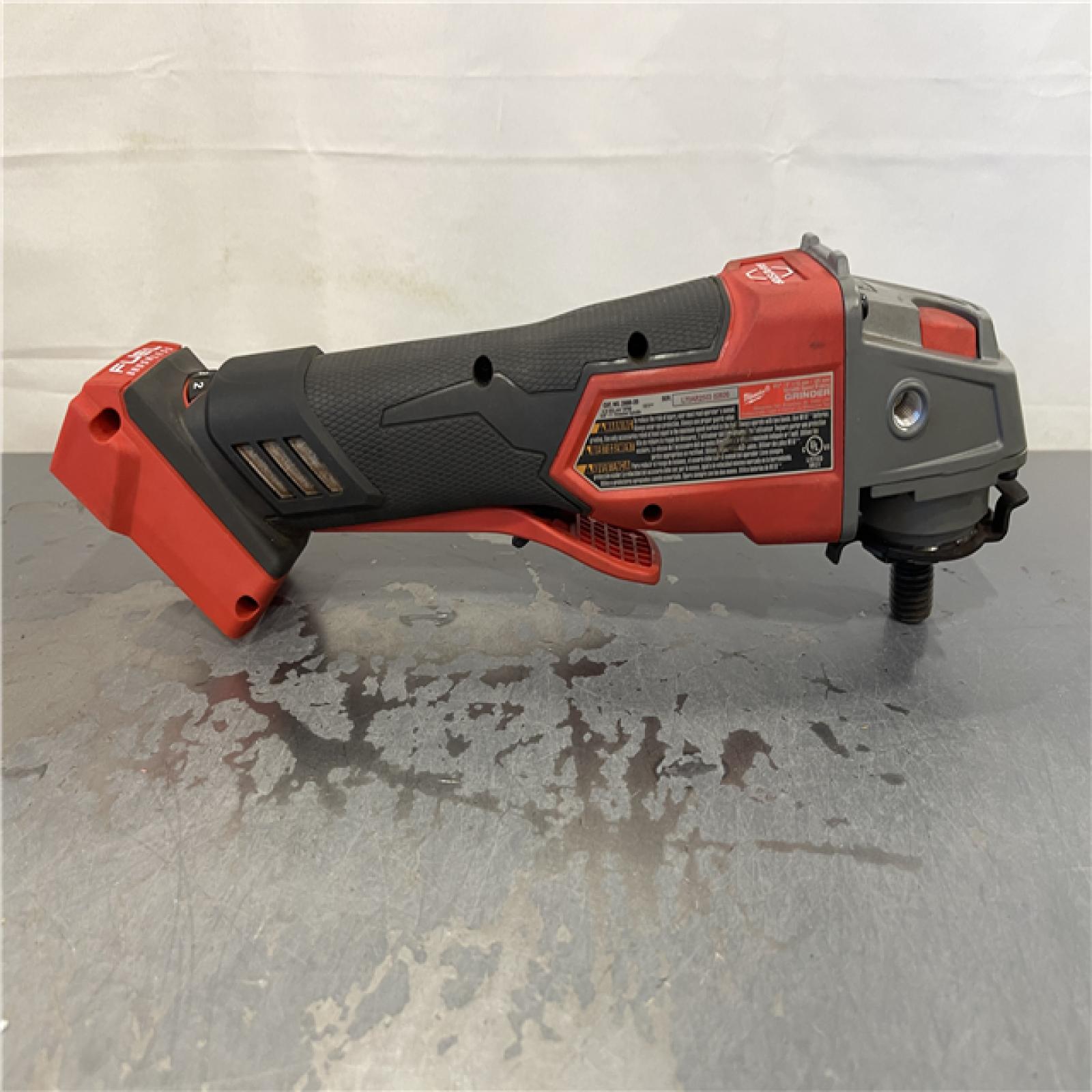 AS-IS - Milwaukee M18 FUEL 18V Lithium-Ion Brushless Cordless 4-1/2 in./5 in. Grinder with Variable Speed & Paddle Switch