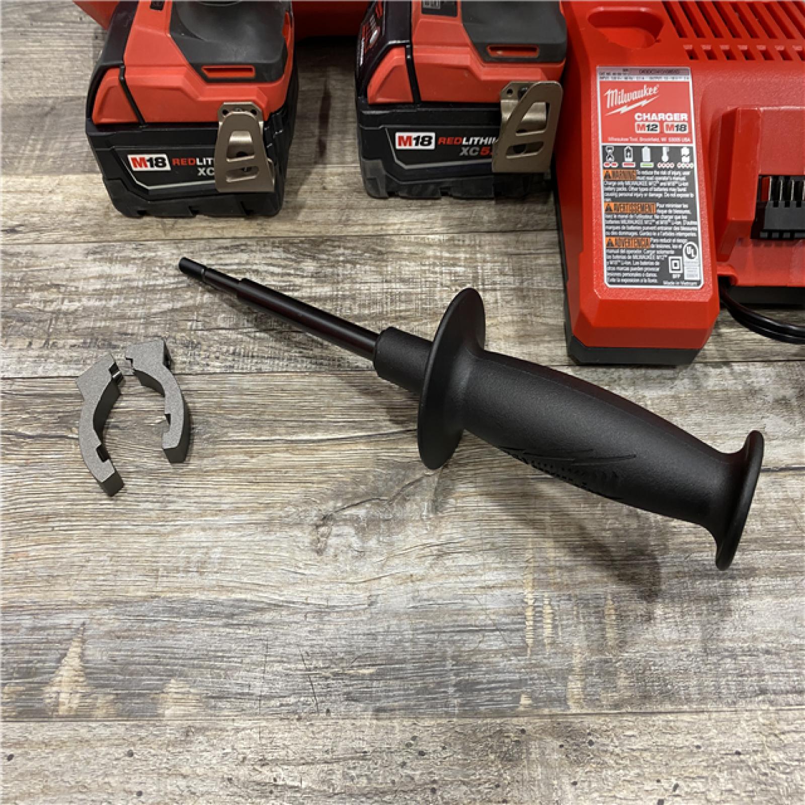 AS-IS Milwaukee FUEL 18V Lithium-Ion Brushless Cordless Hammer Drill and Impact Driver Combo Kit