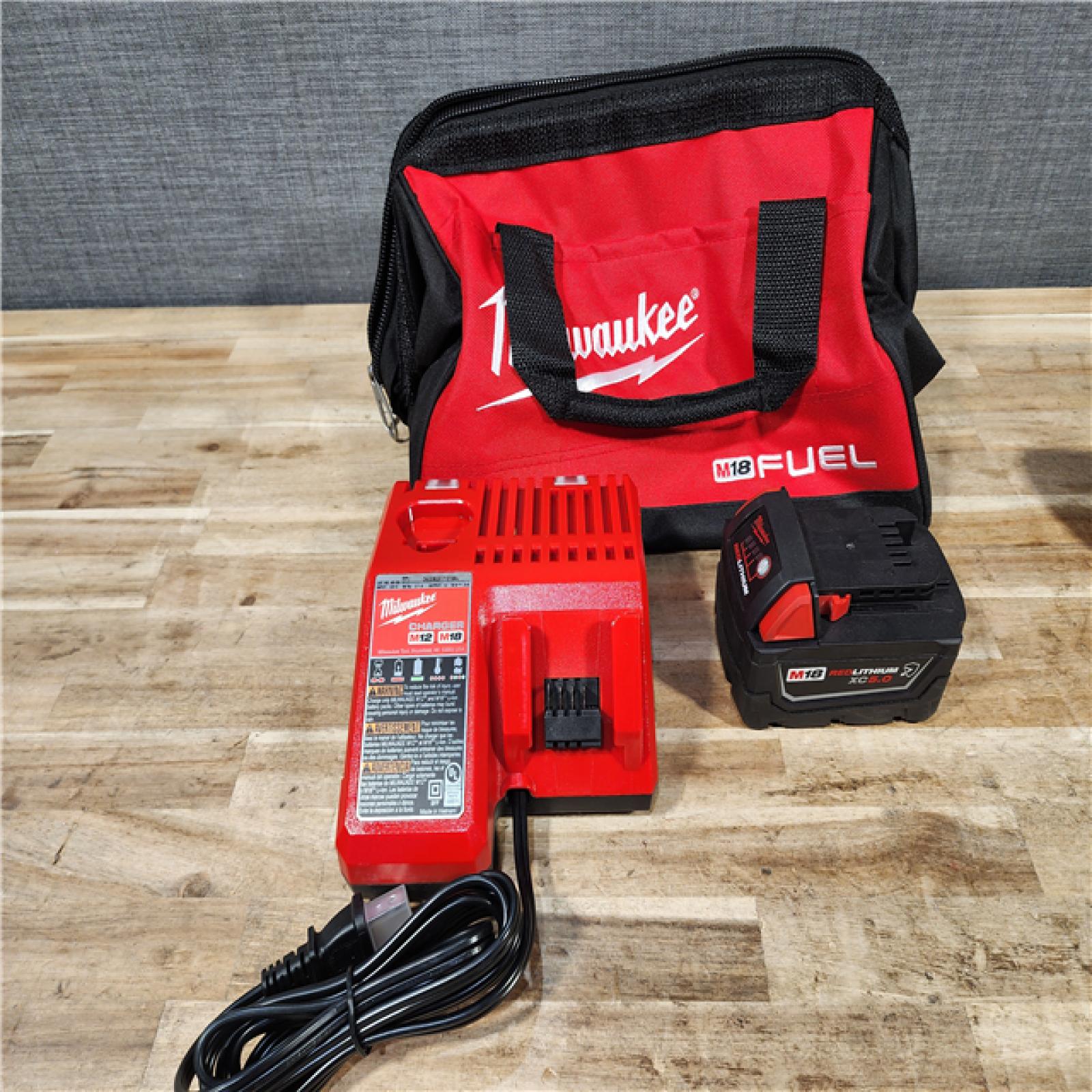 HOUSTON LOCATION - AS-IS (APPEARS LIKE NEW) Milwaukee FUEL 18V Lithium-Ion Brushless Cordless 1/2 in. Impact Wrench w/Friction Ring Kit