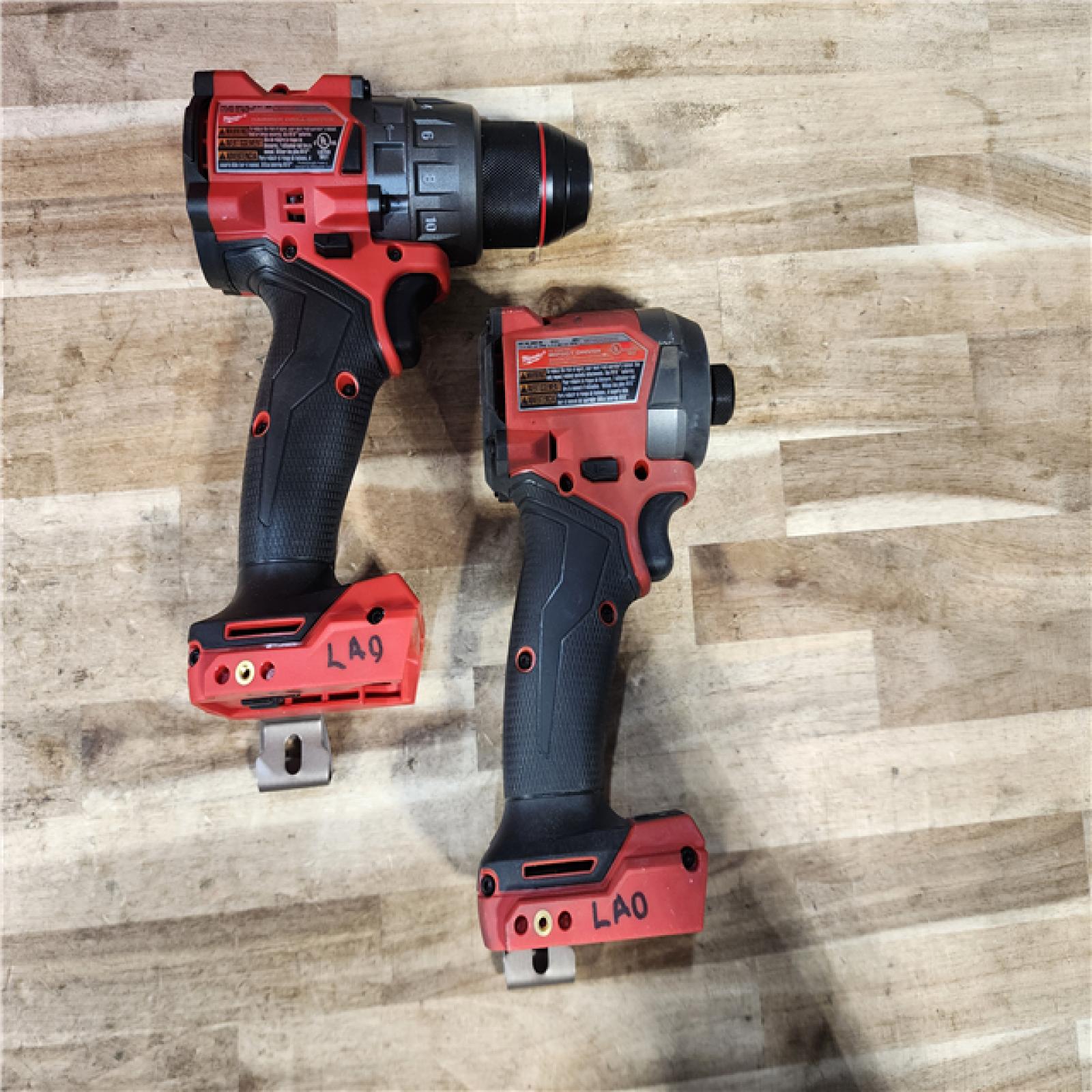 HOUSTON LOCATION - AS-IS Milwaukee FUEL 18V Lithium-Ion Brushless Cordless Hammer Drill and Impact Driver Combo Kit