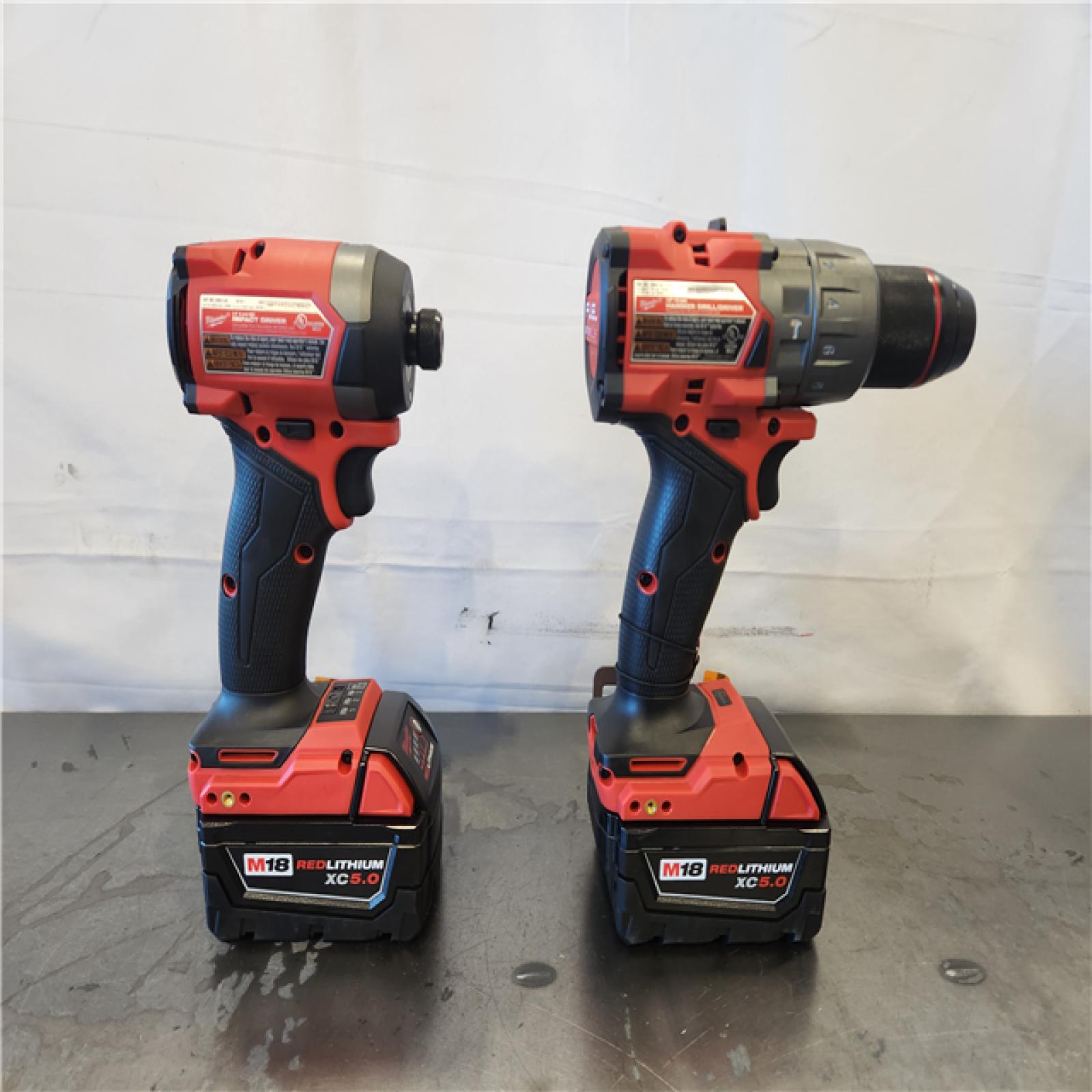 AS-IS- Milwaukee FUEL 18V Lithium-Ion Brushless Cordless Hammer Drill and Impact Driver Combo Kit