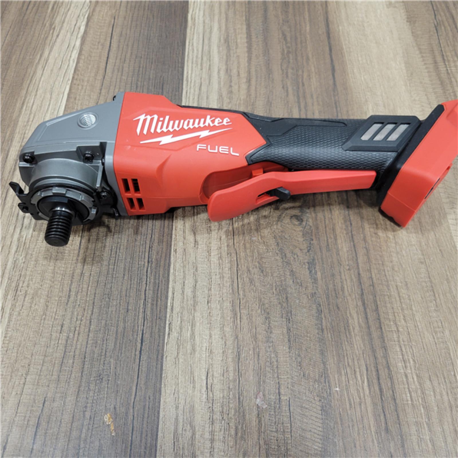 AS-IS Milwaukee 2880-20 M18 FUEL 18-Volt Lithium-Ion Brushless Cordless 4-1/2 in./5 in. Grinder W/Paddle Switch (Tool-Only)