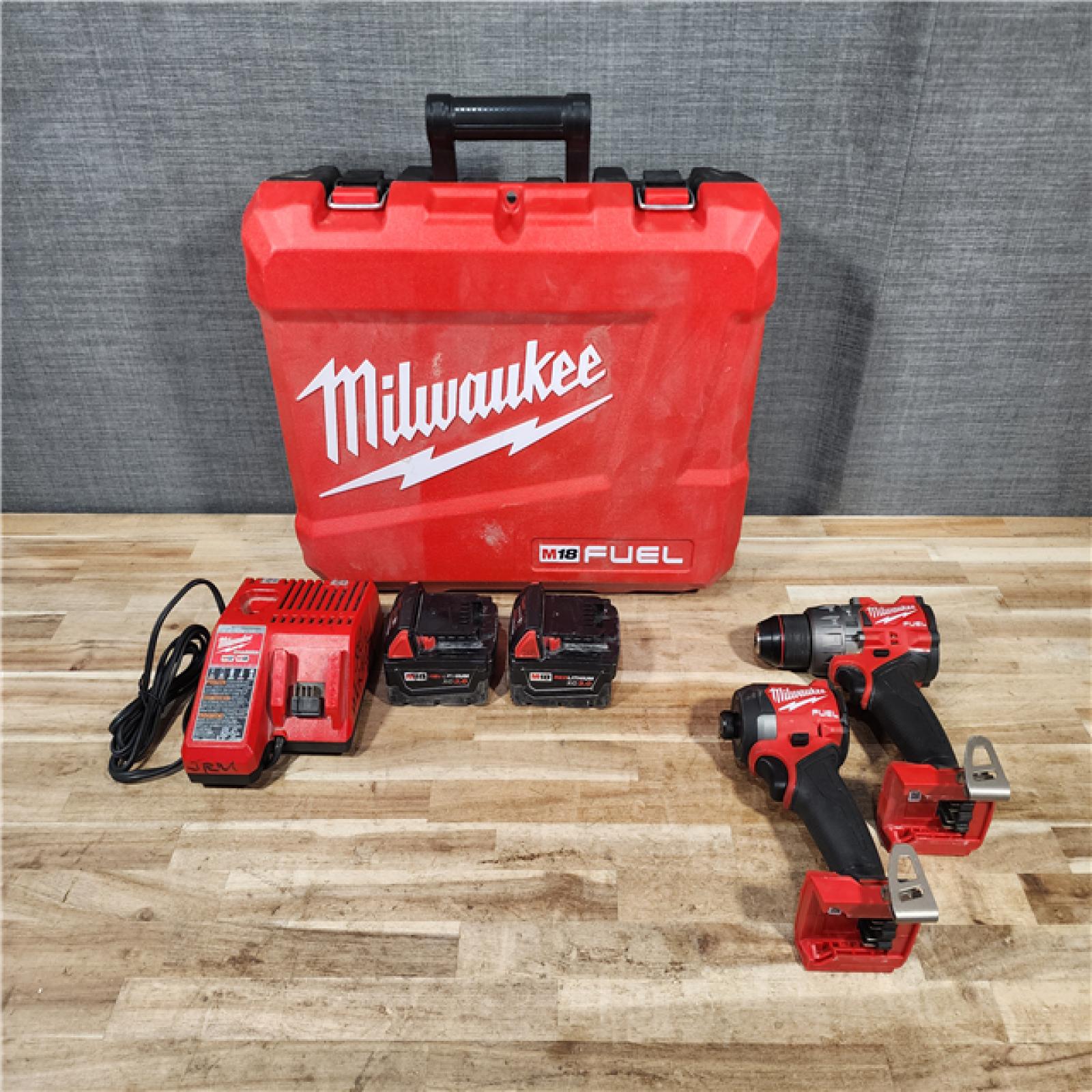 HOUSTON LOCATION - AS-IS Milwaukee FUEL 18V Lithium-Ion Brushless Cordless Hammer Drill and Impact Driver Combo Kit