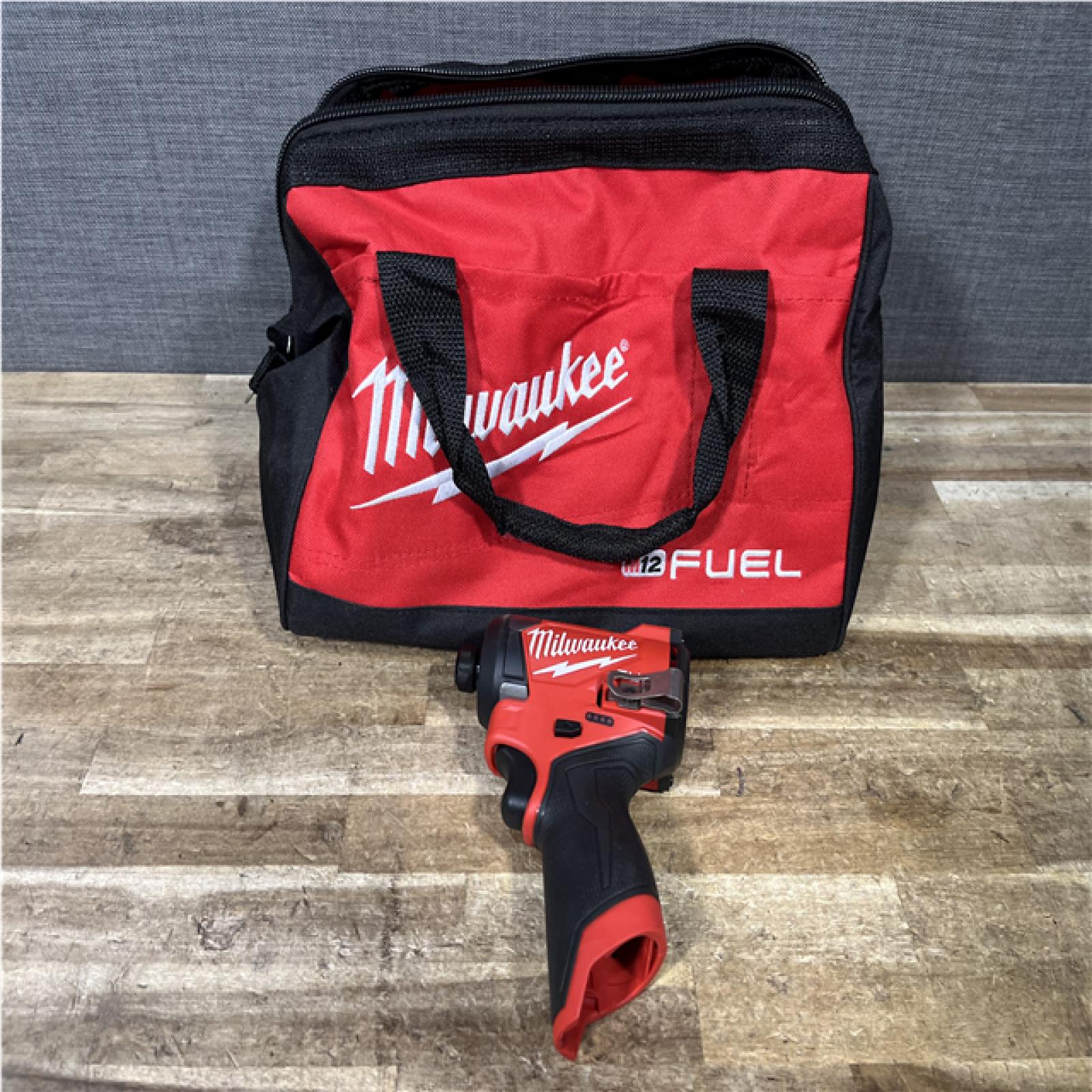 Houston Location AS-IS Milwaukee FUEL 12V Lithium-Ion Brushless Cordless 1/4 in. Hex Impact Driver (Tool-Only)