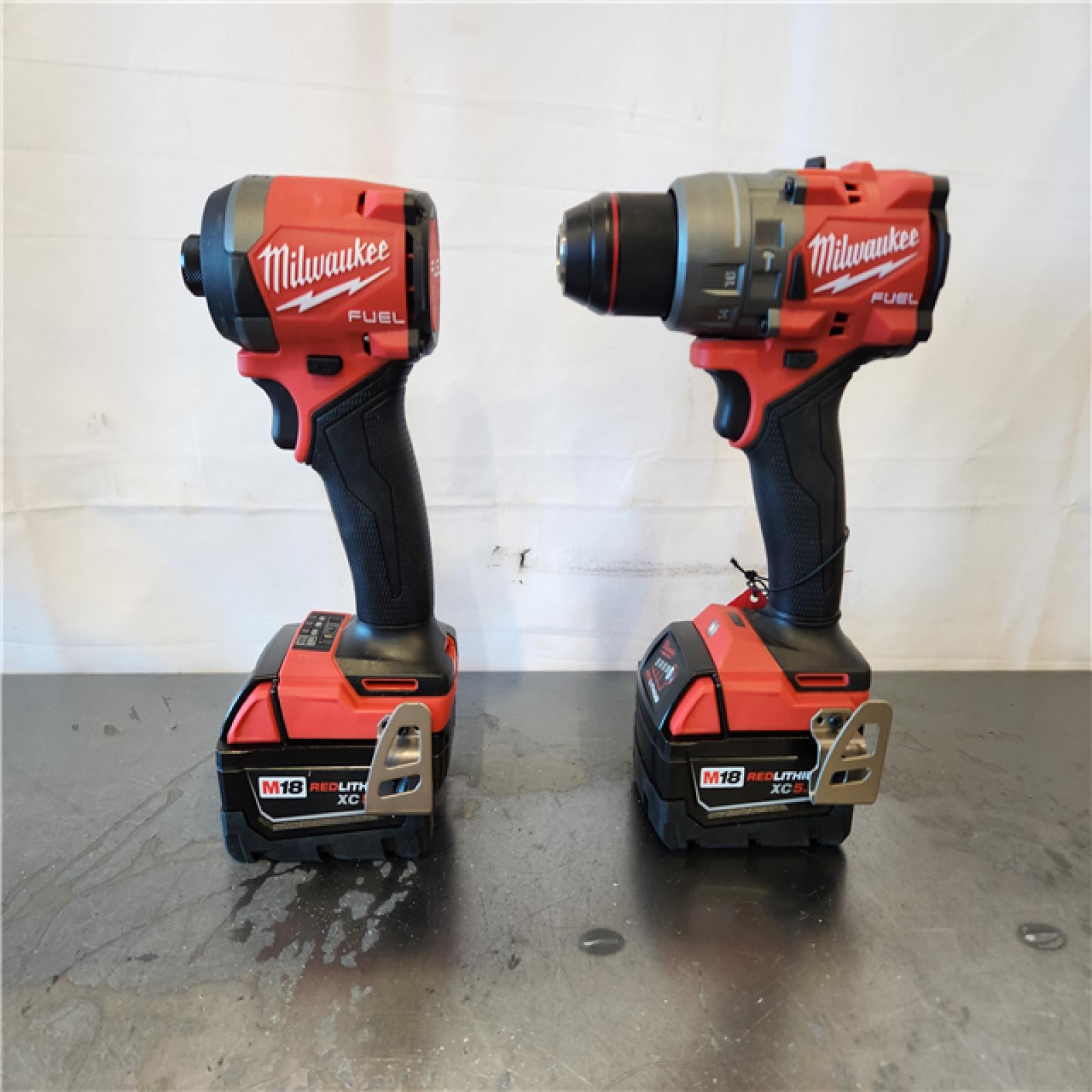 AS-IS- Milwaukee FUEL 18V Lithium-Ion Brushless Cordless Hammer Drill and Impact Driver Combo Kit