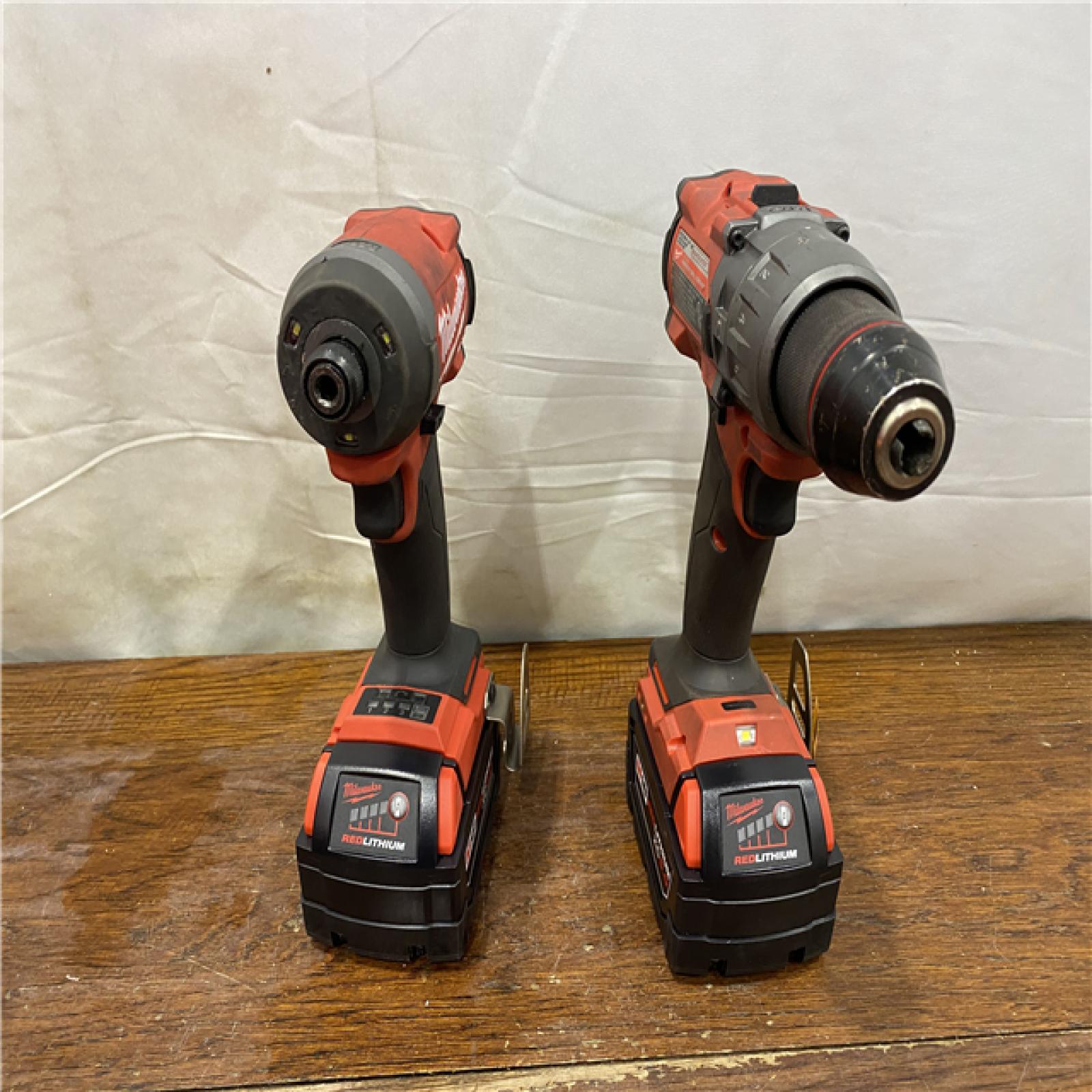 AS-IS MILWAUKEE M18 FUEL 18V Lithium-Ion Brushless Cordless Hammer Drill and Impact Driver Combo Kit (2-Tool) with 2 Batteries