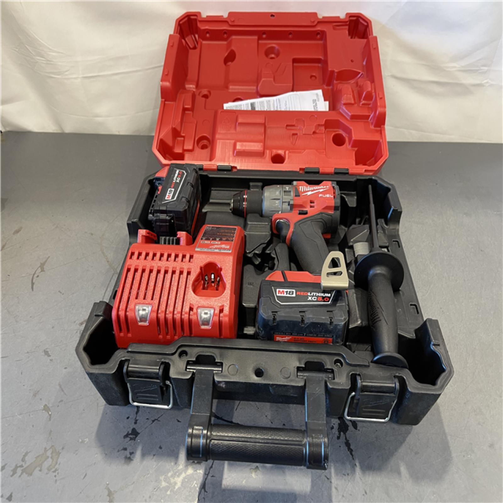AS-IS - Milwaukee M18 FUEL 18V Lithium-Ion Brushless Cordless 1/2 in. Hammer Drill Driver Kit